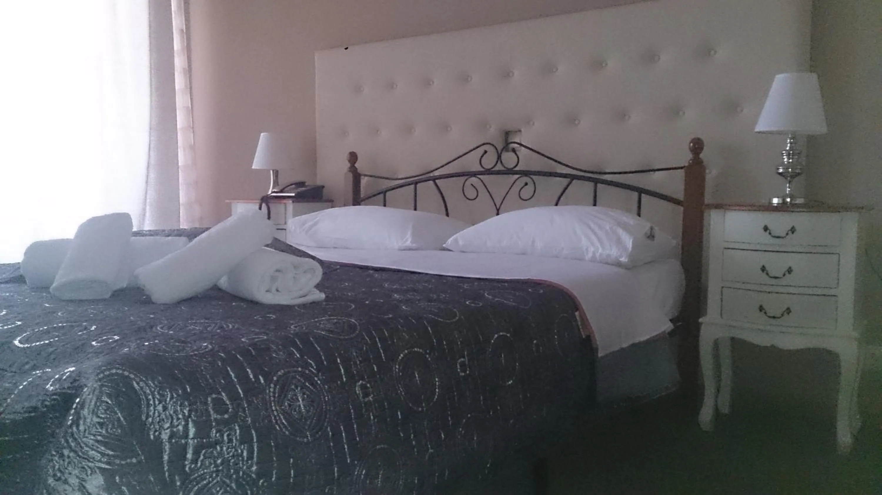 Bed in Hotel Villa Tasko