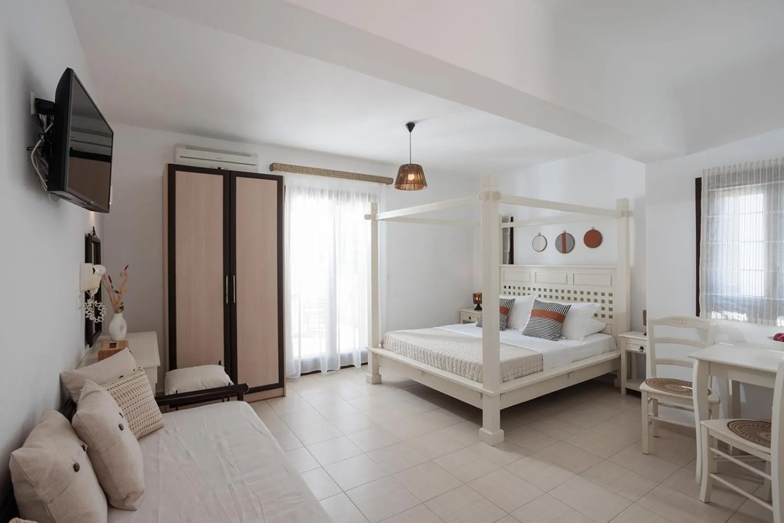 Bed in Anemomilos Beach hotel