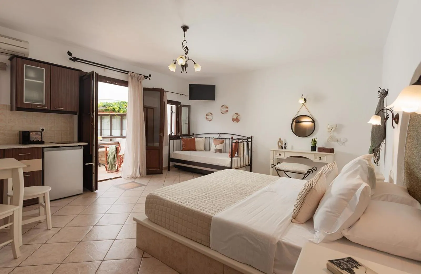 Bed in Anemomilos Beach hotel