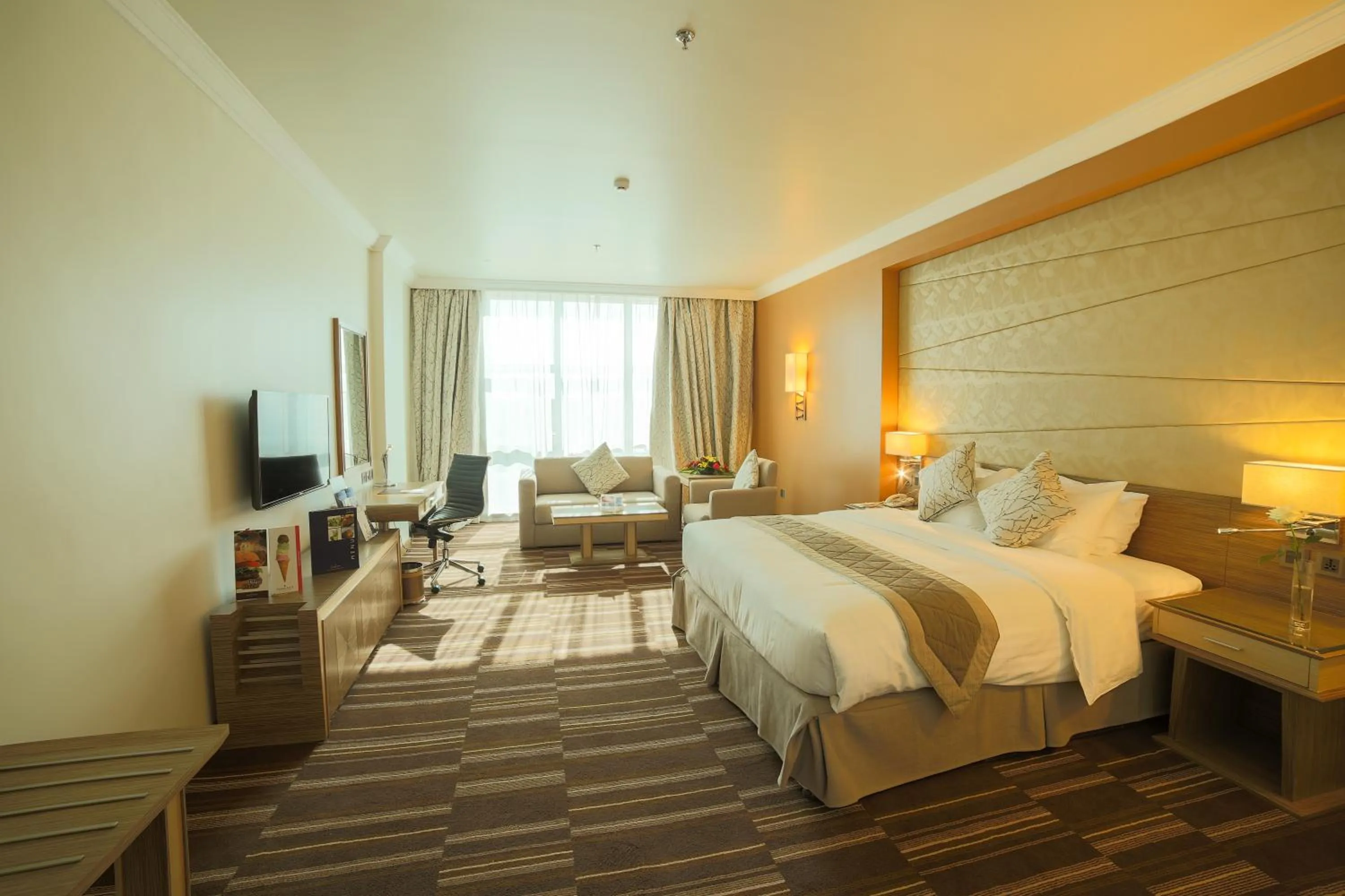 Photo of the whole room, Bed in Golden Tulip Hotel Buraidah Al Qassim