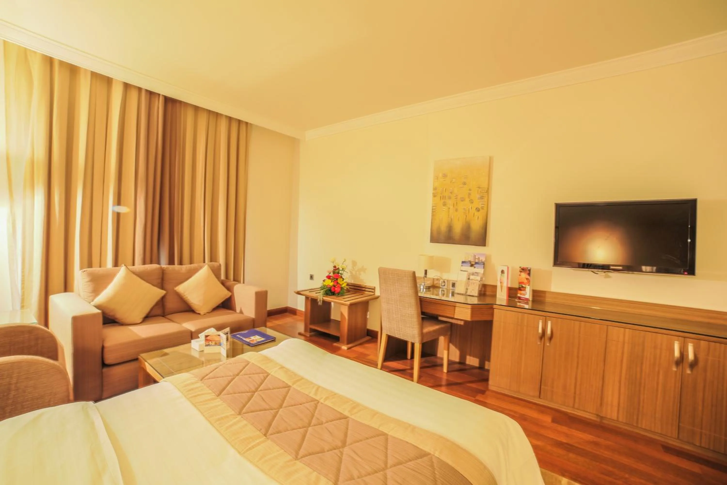 Photo of the whole room, Bed in Golden Tulip Hotel Buraidah Al Qassim