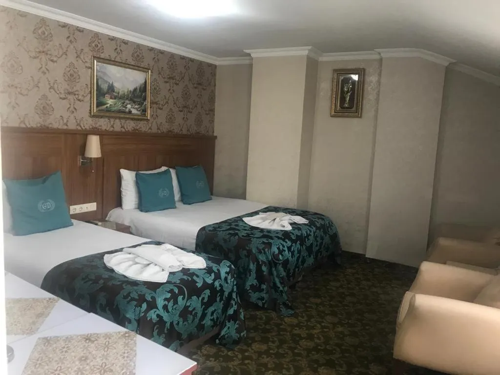 Bed in Grand Dilara Hotel