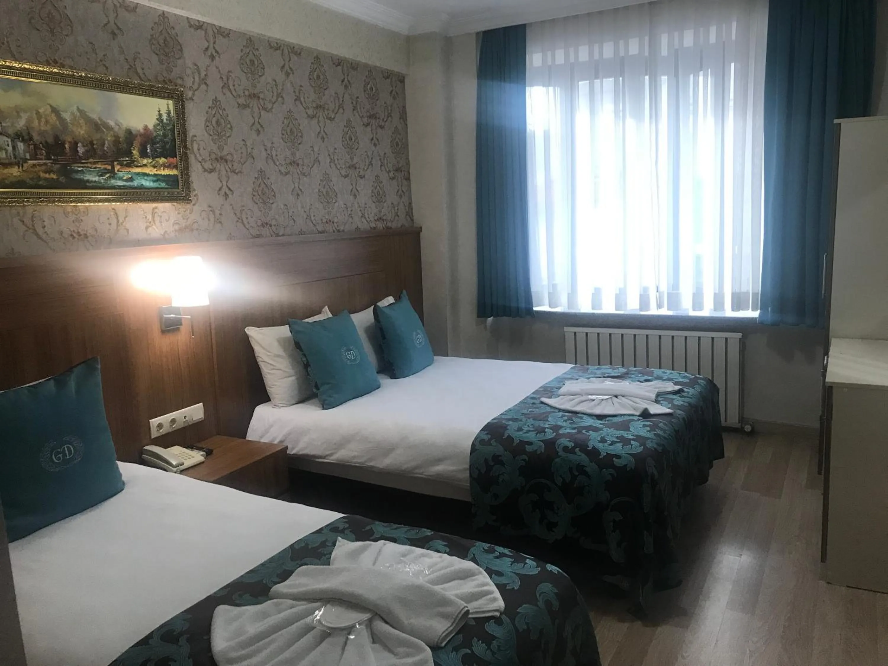 Bed in Grand Dilara Hotel