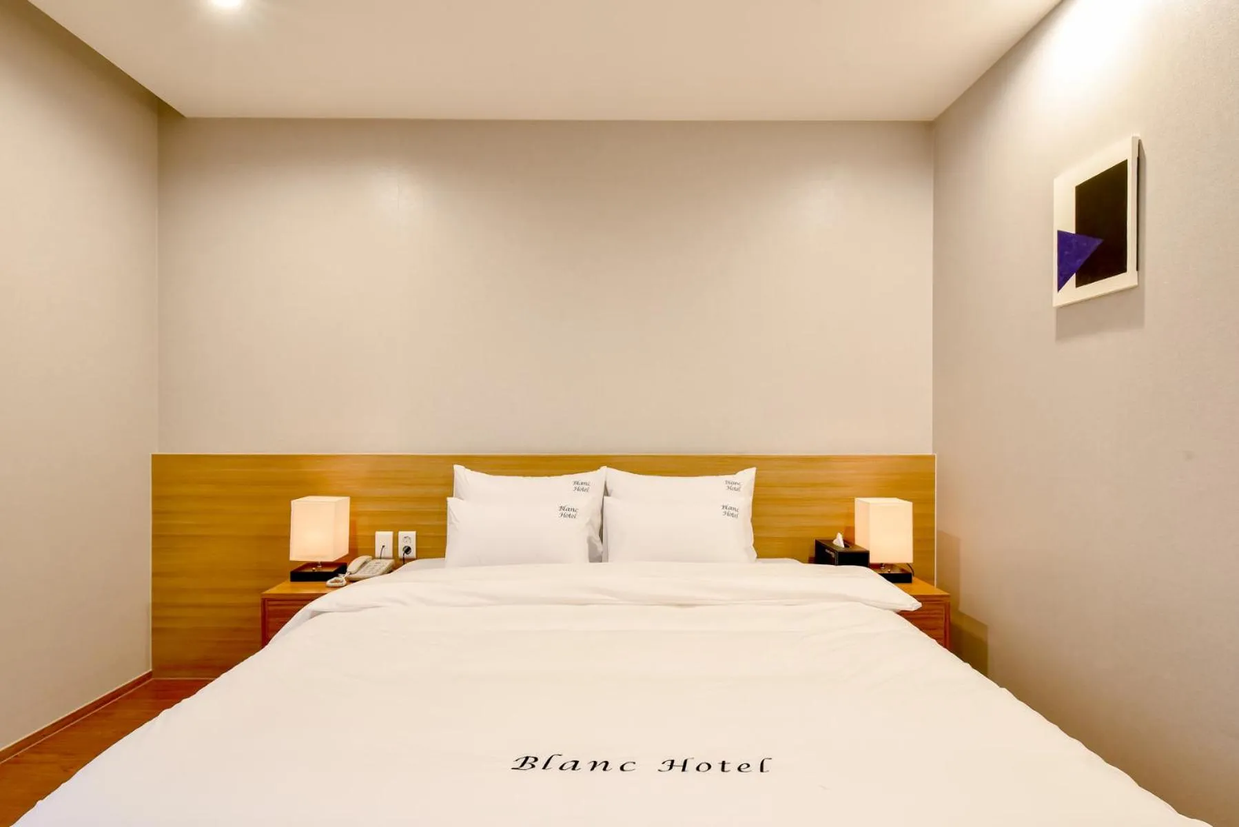 Bed in Blanc Business Hotel