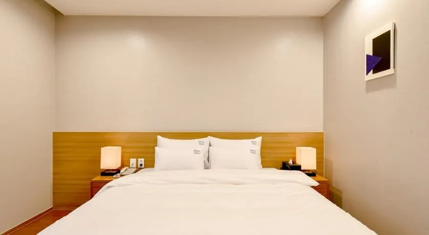 Bed in Blanc Business Hotel