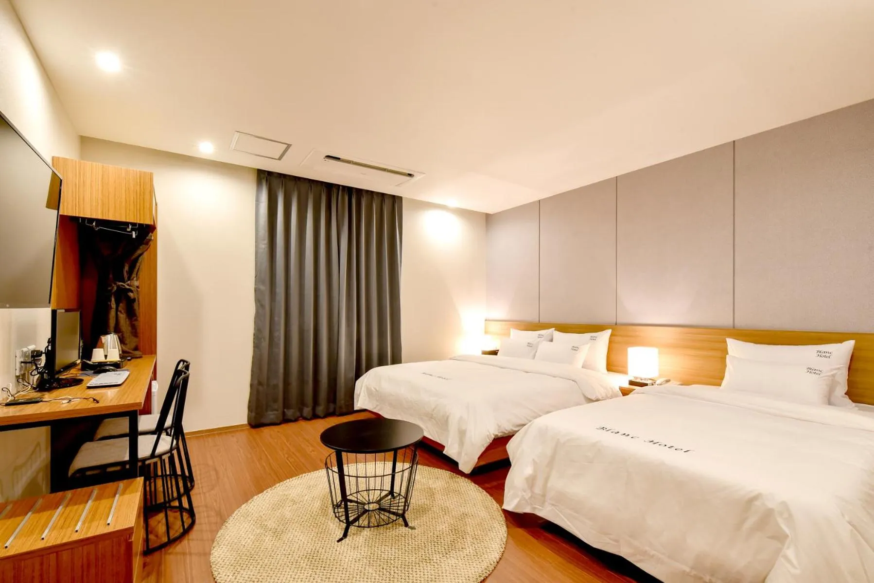 Bed in Blanc Business Hotel