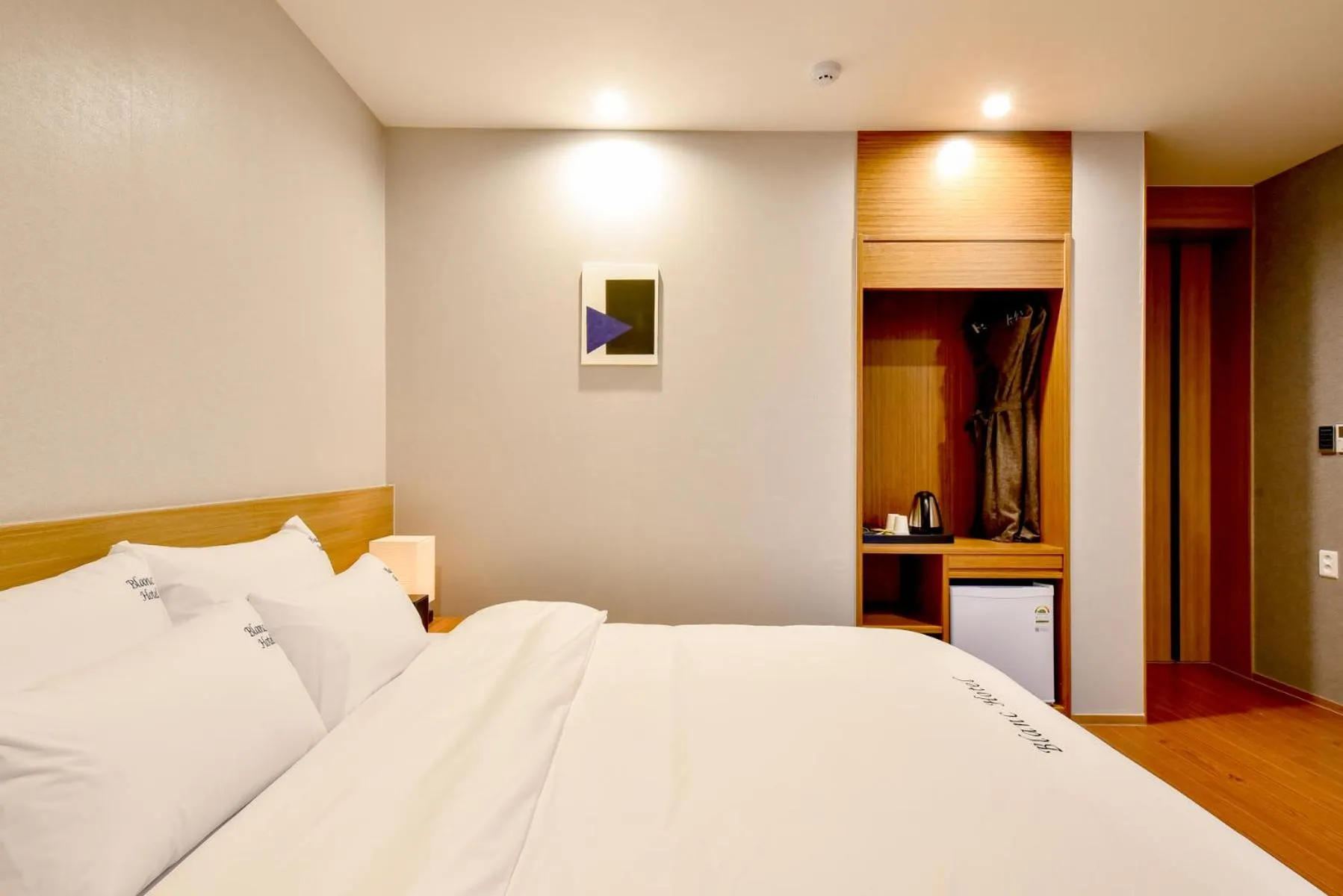 Bed in Blanc Business Hotel