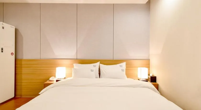 Bed in Blanc Business Hotel