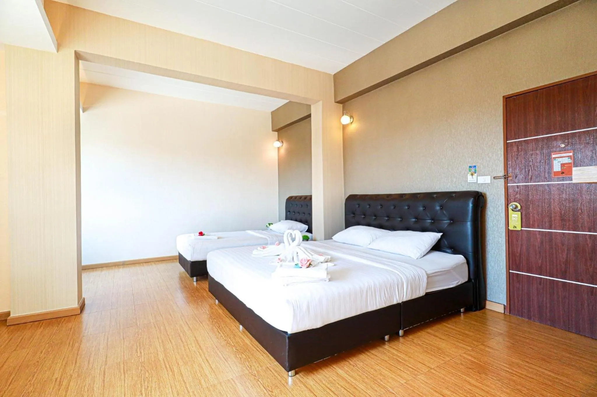 Photo of the whole room, Bed in Triple Trees Hotel