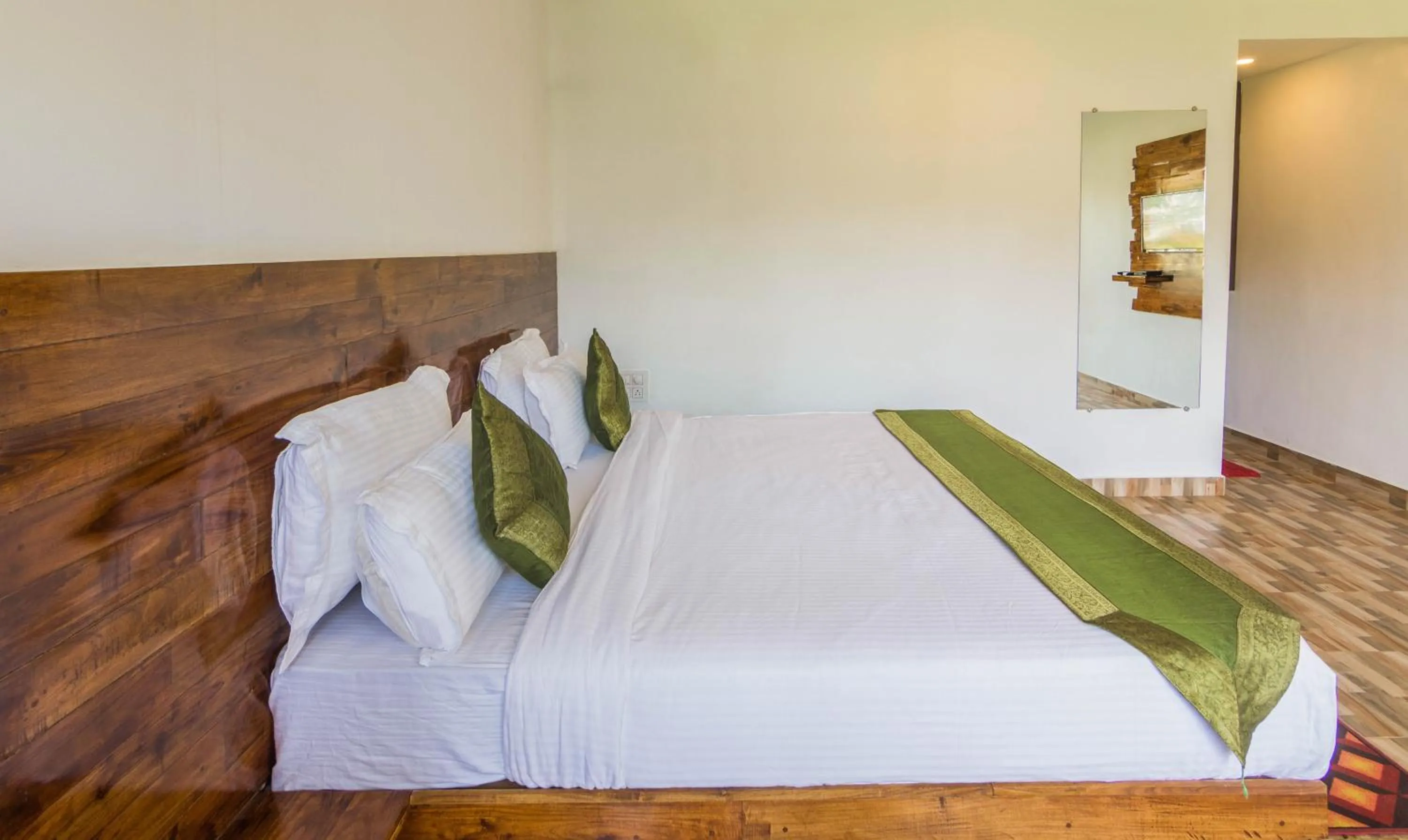 Bed in Treebo Lands End Beach Resort Morjim