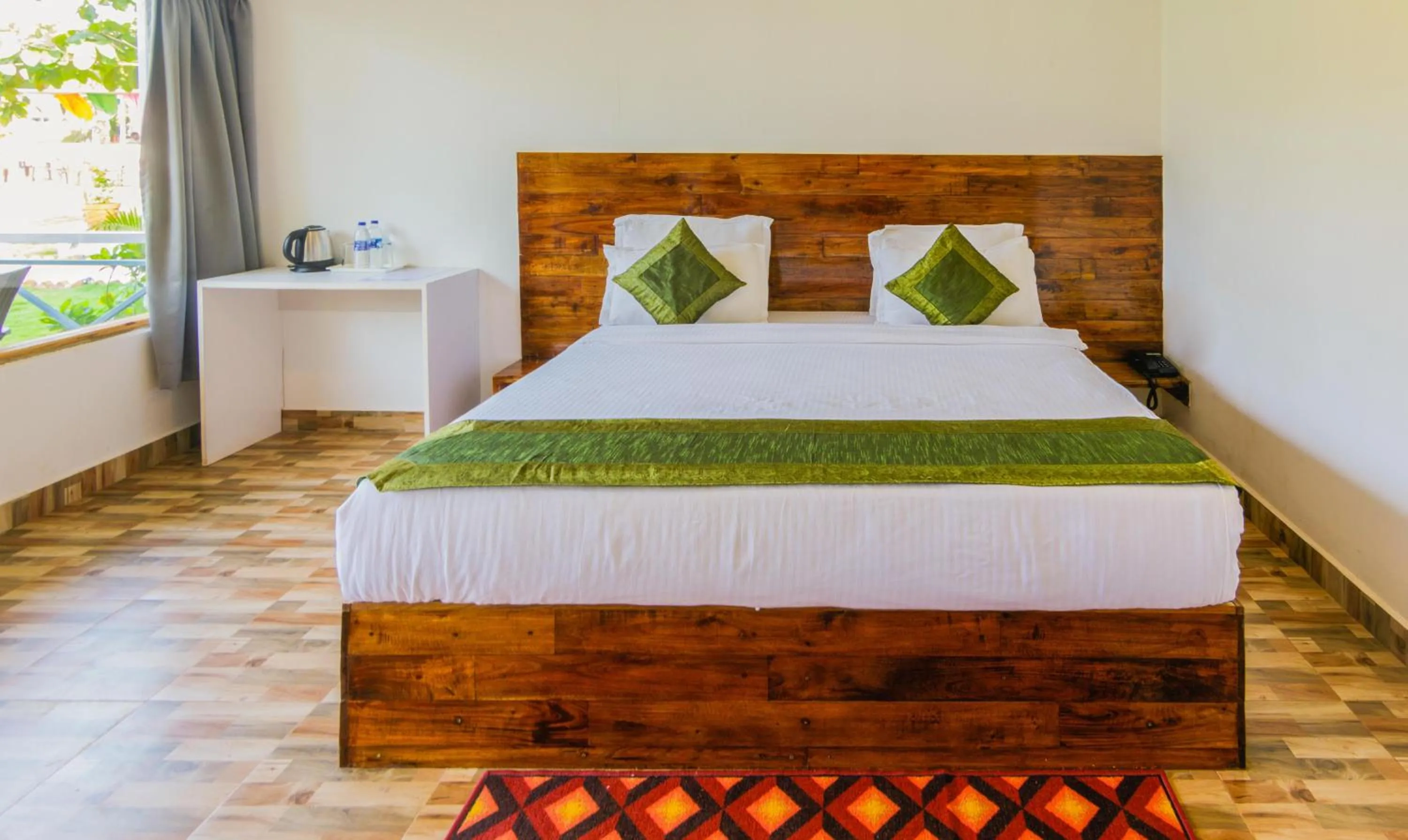 Bed in Treebo Lands End Beach Resort Morjim