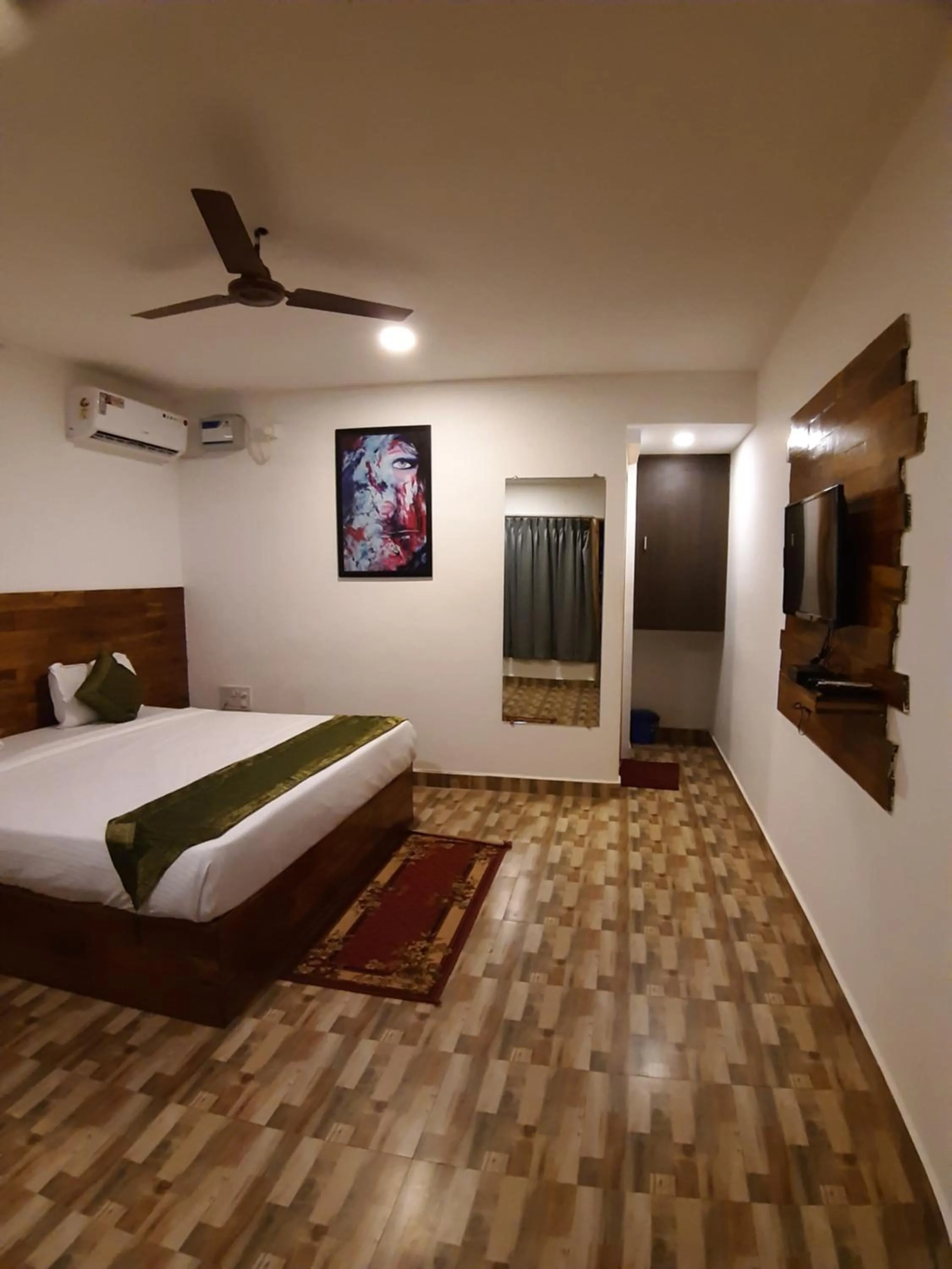 Bed in Treebo Lands End Beach Resort Morjim