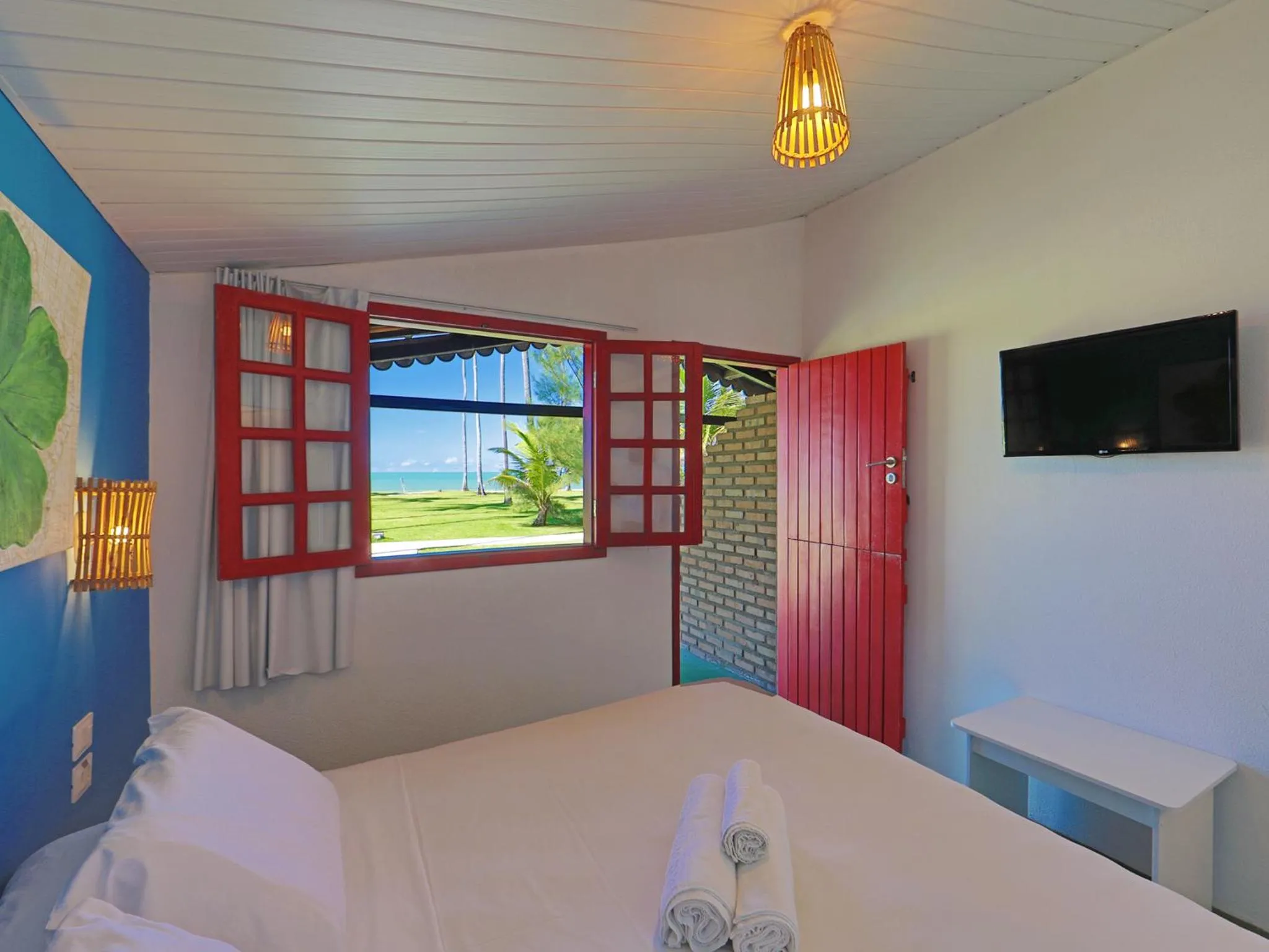 Photo of the whole room, Bed in Pousada Xalés de Maracaípe