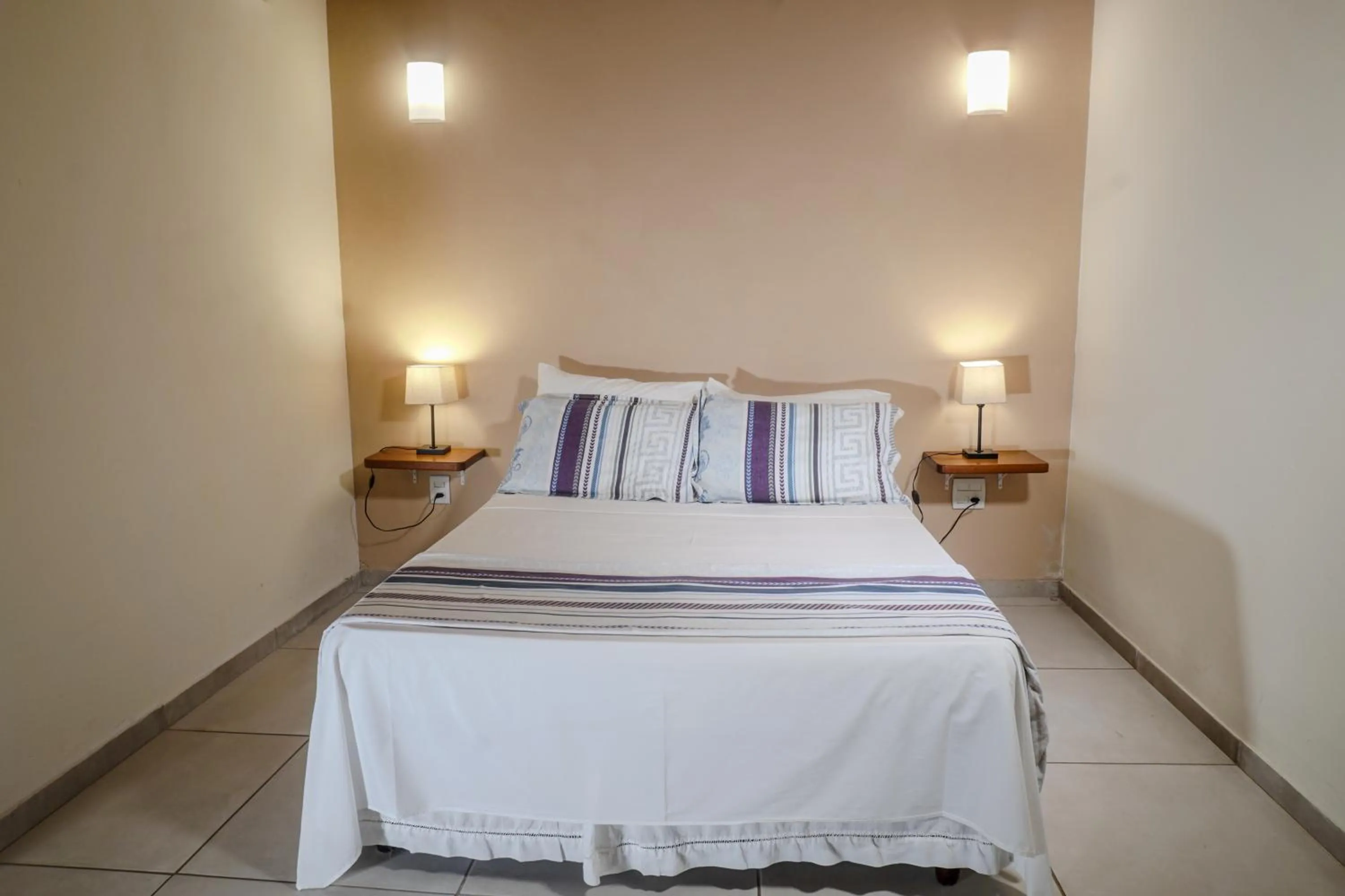 Bed in Pousada Solar D Alcina