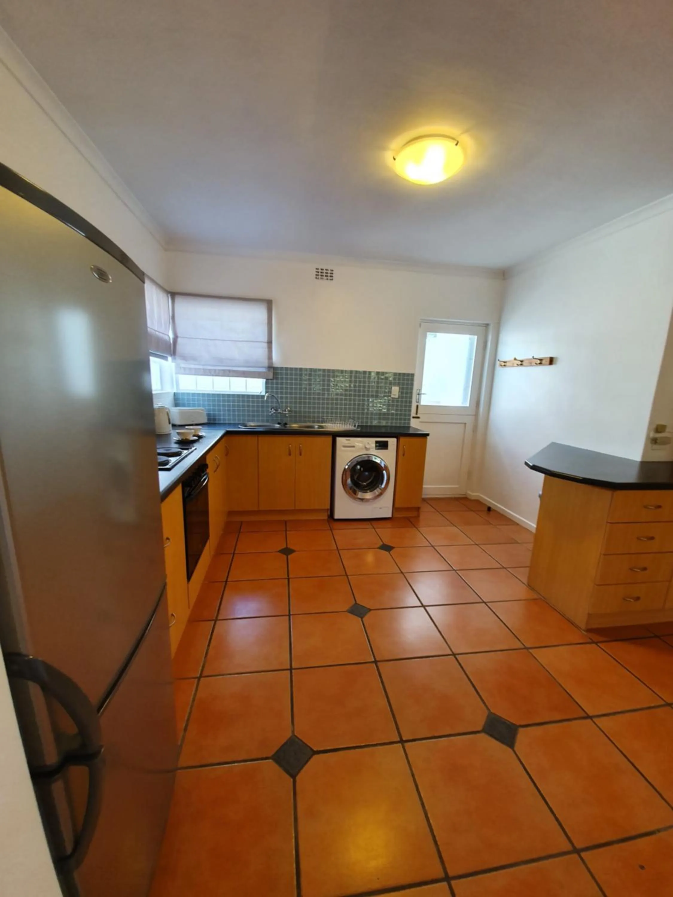 Kitchen or kitchenette in Paradiso Guesthouse & Self-catering Cottage