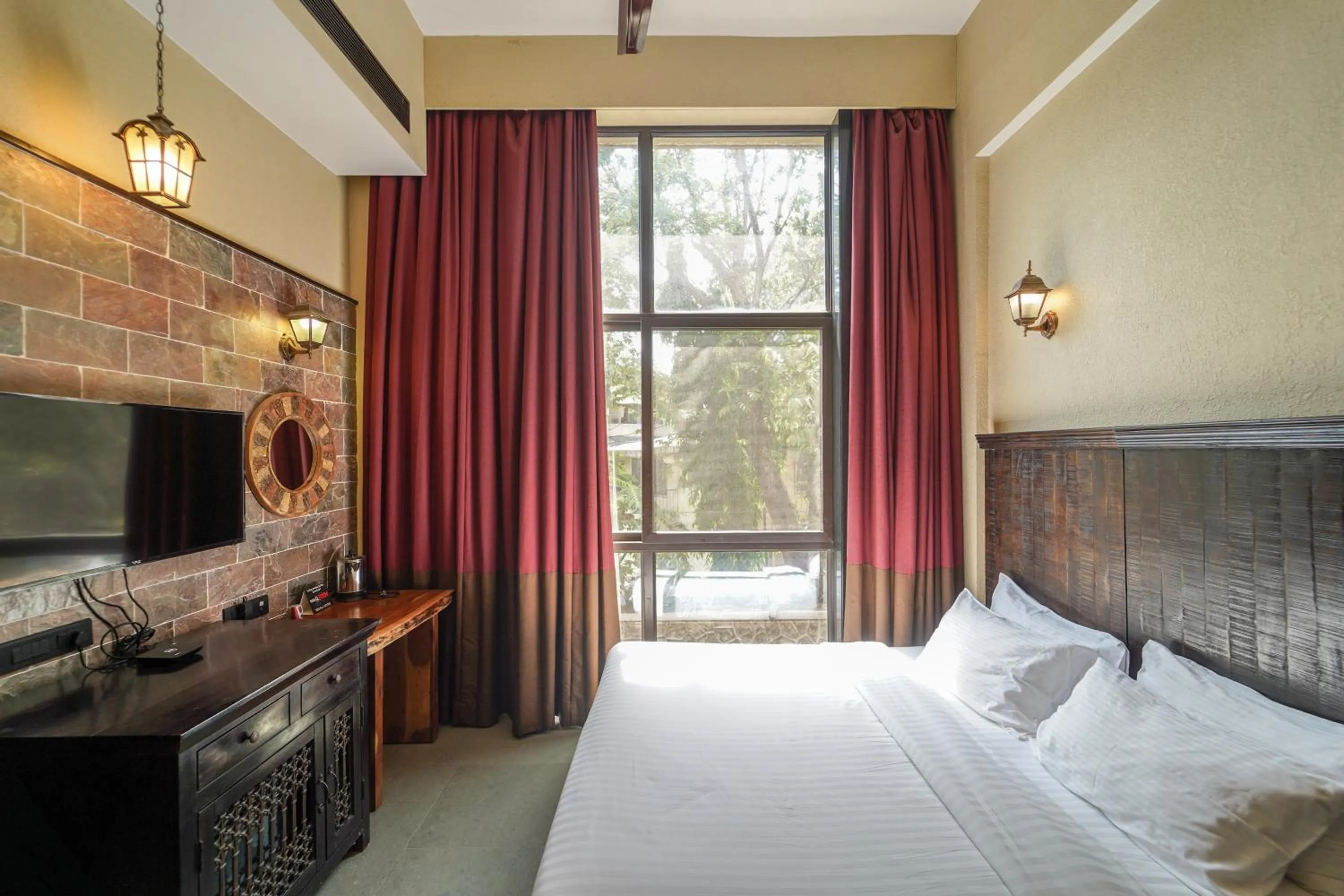 Photo of the whole room, Bed in Triose Boutique Hotel Lonavala