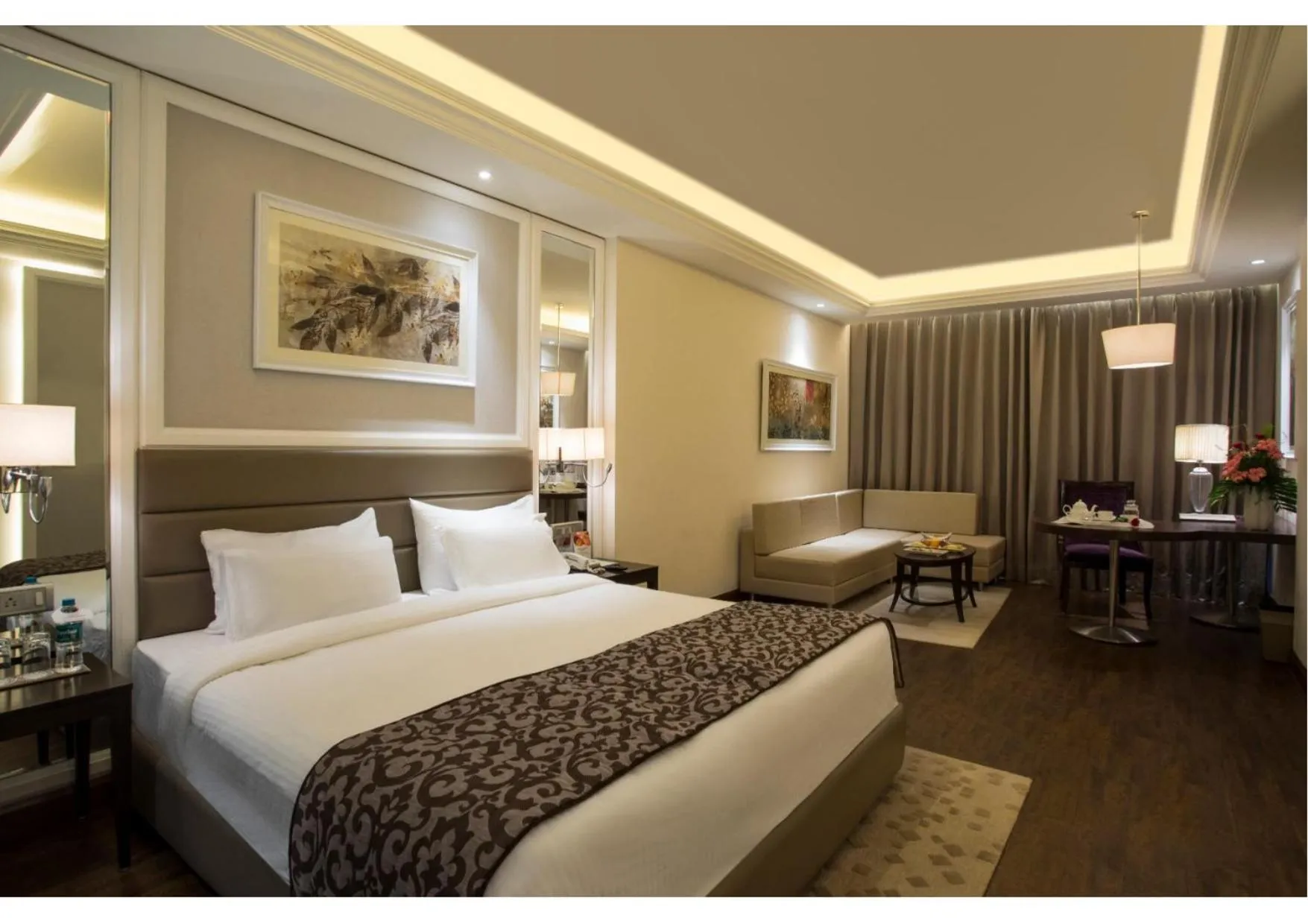 Dining area, Bed in Singhania Sarovar Portico