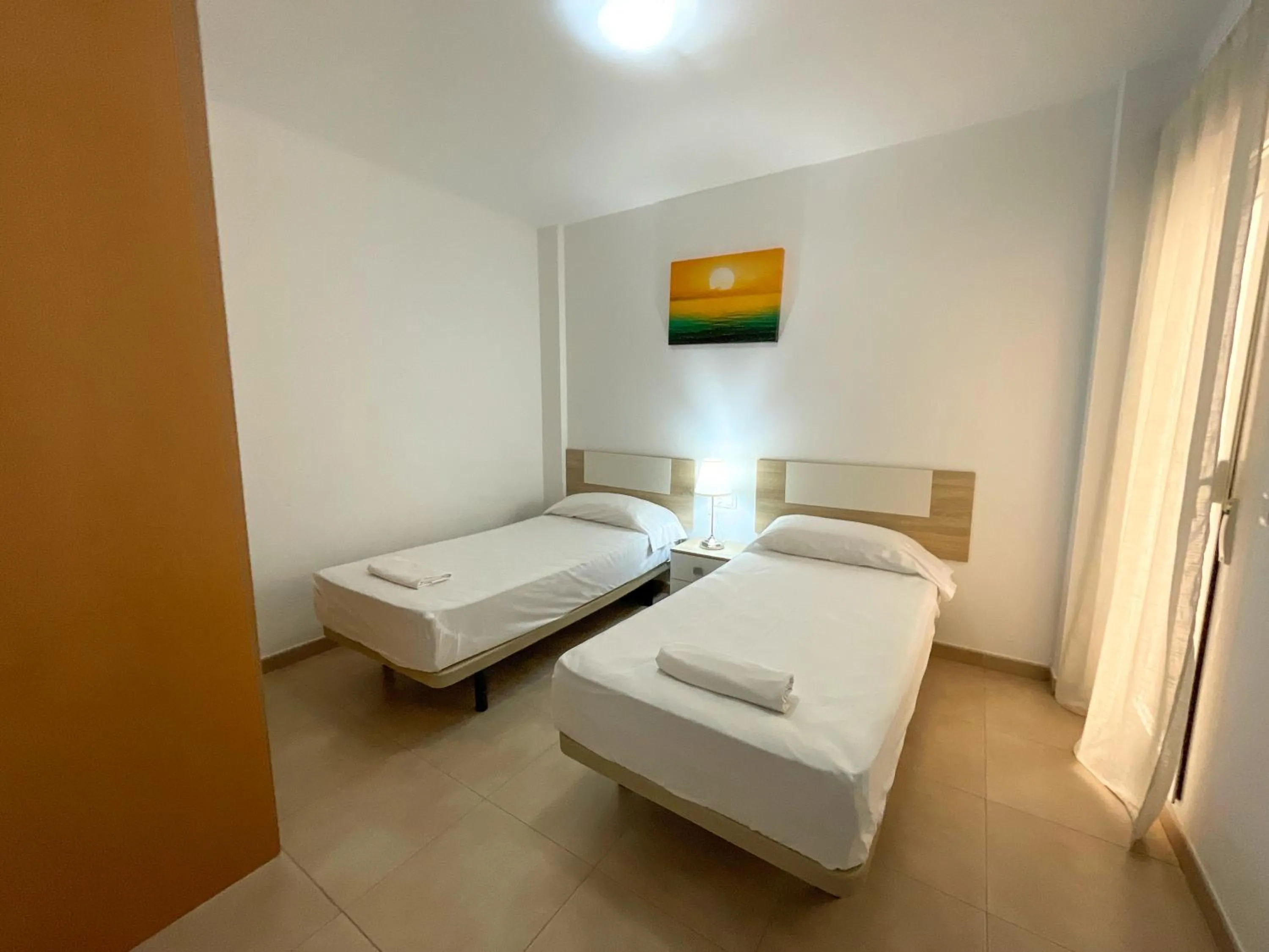 Bed in Apartamentos Neptuno 3000