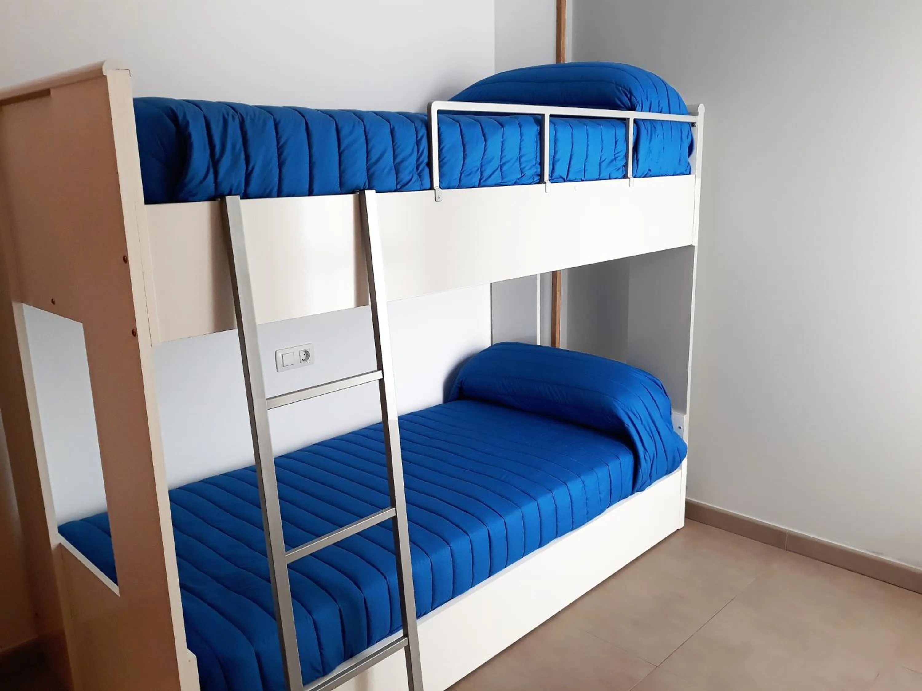 Bed in Apartamentos Neptuno 3000