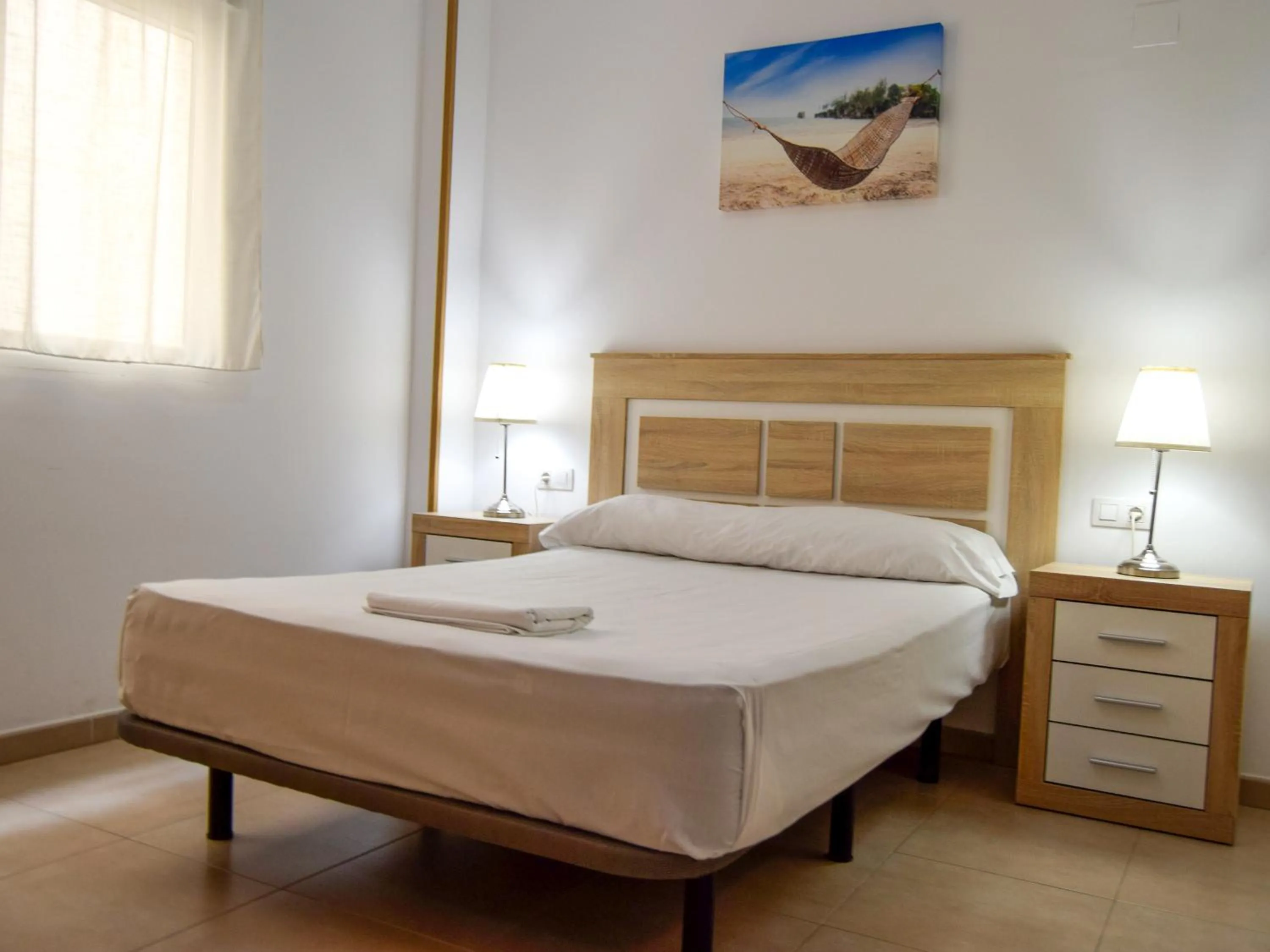 Photo of the whole room, Bed in Apartamentos Neptuno 3000
