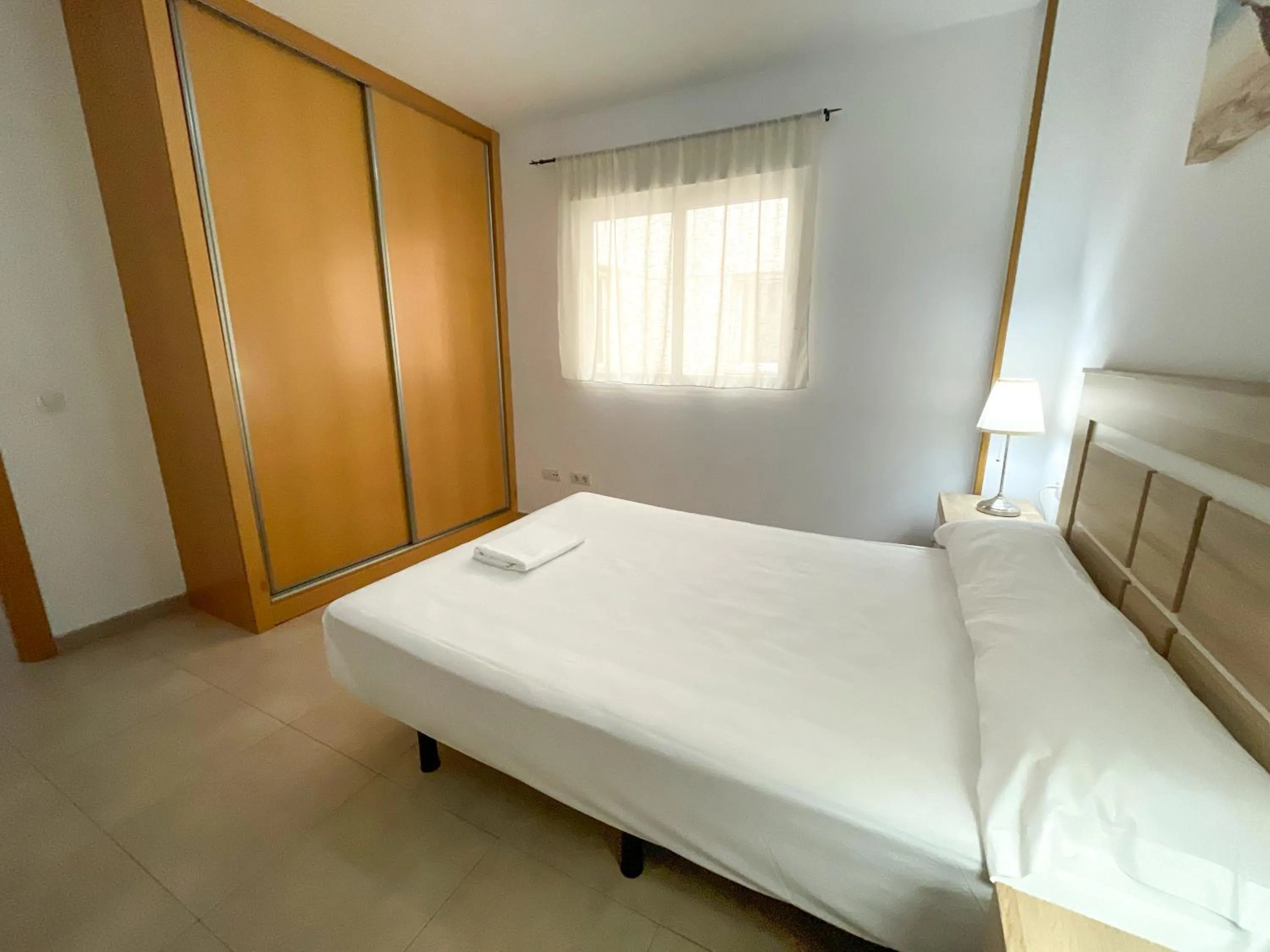 Bed in Apartamentos Neptuno 3000