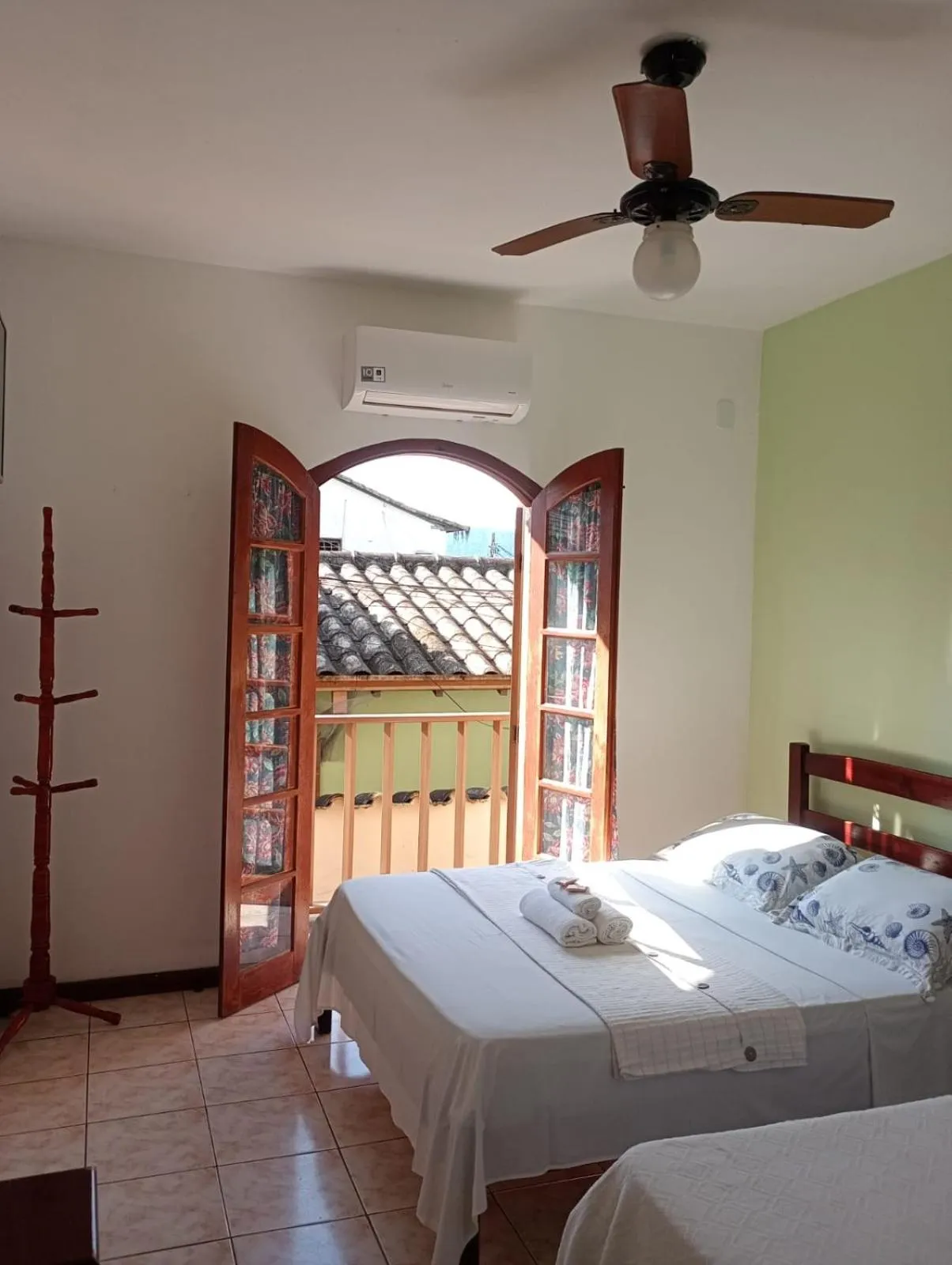 Bed in Pousada Alecrim Dourado