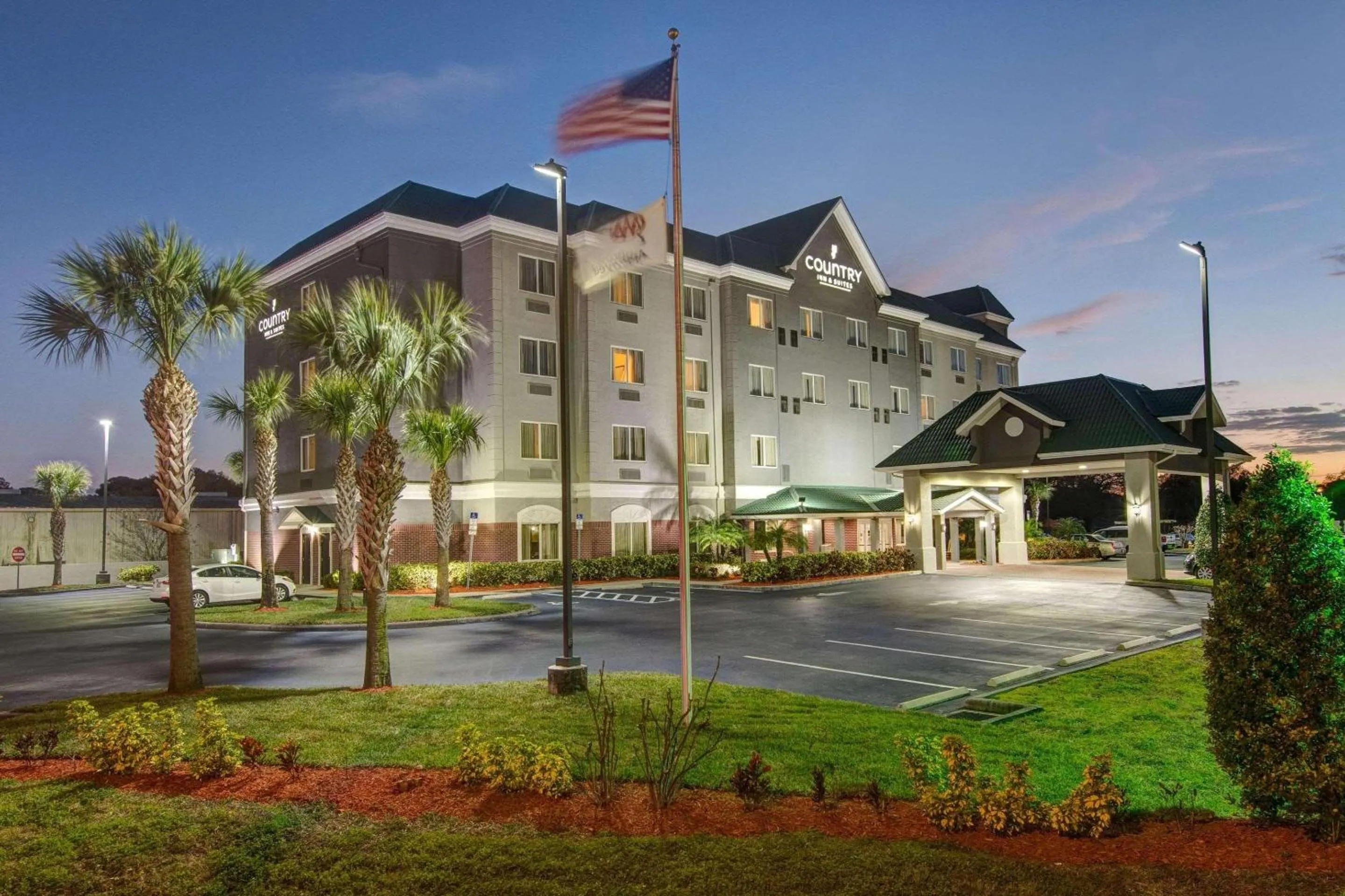 Property building in Country Inn & Suites by Radisson, St Petersburg - Clearwater, FL