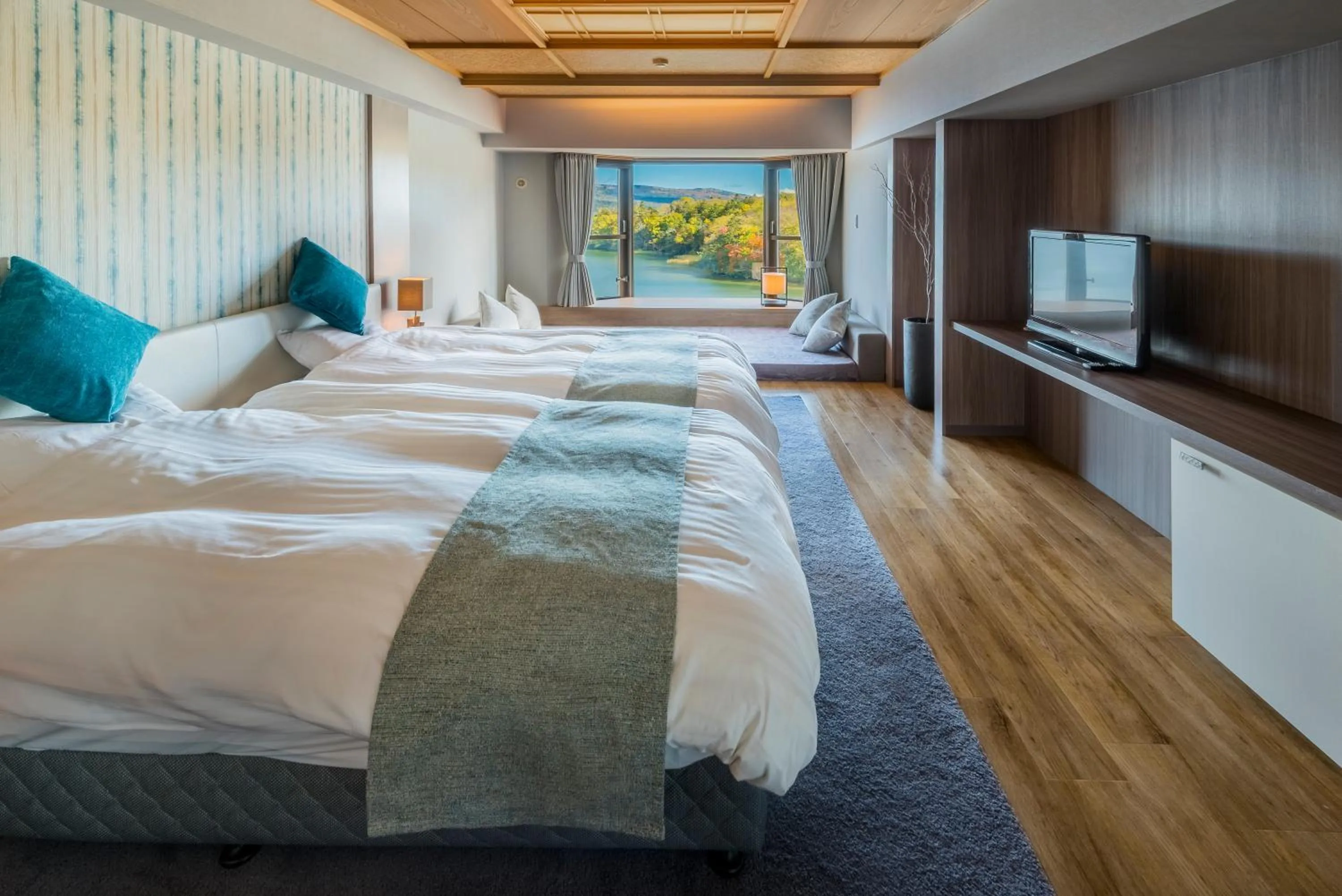 Photo of the whole room, Bed in New Akan Hotel