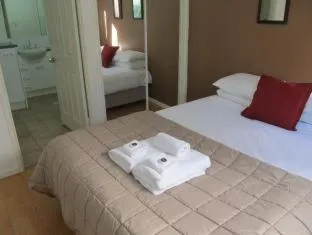 Bed in Costa D'Ora Holiday Apartments