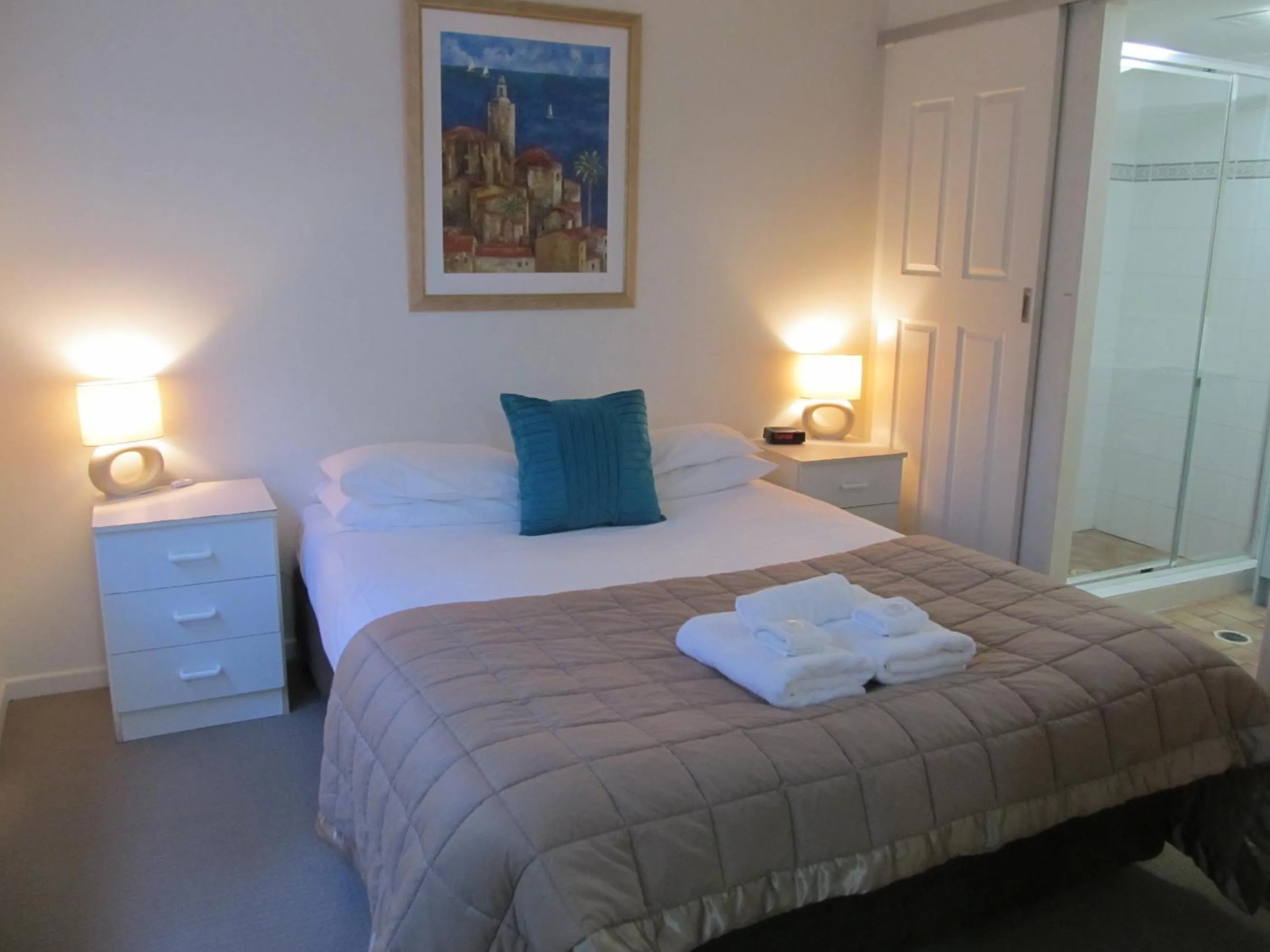 Bed in Costa D'Ora Holiday Apartments