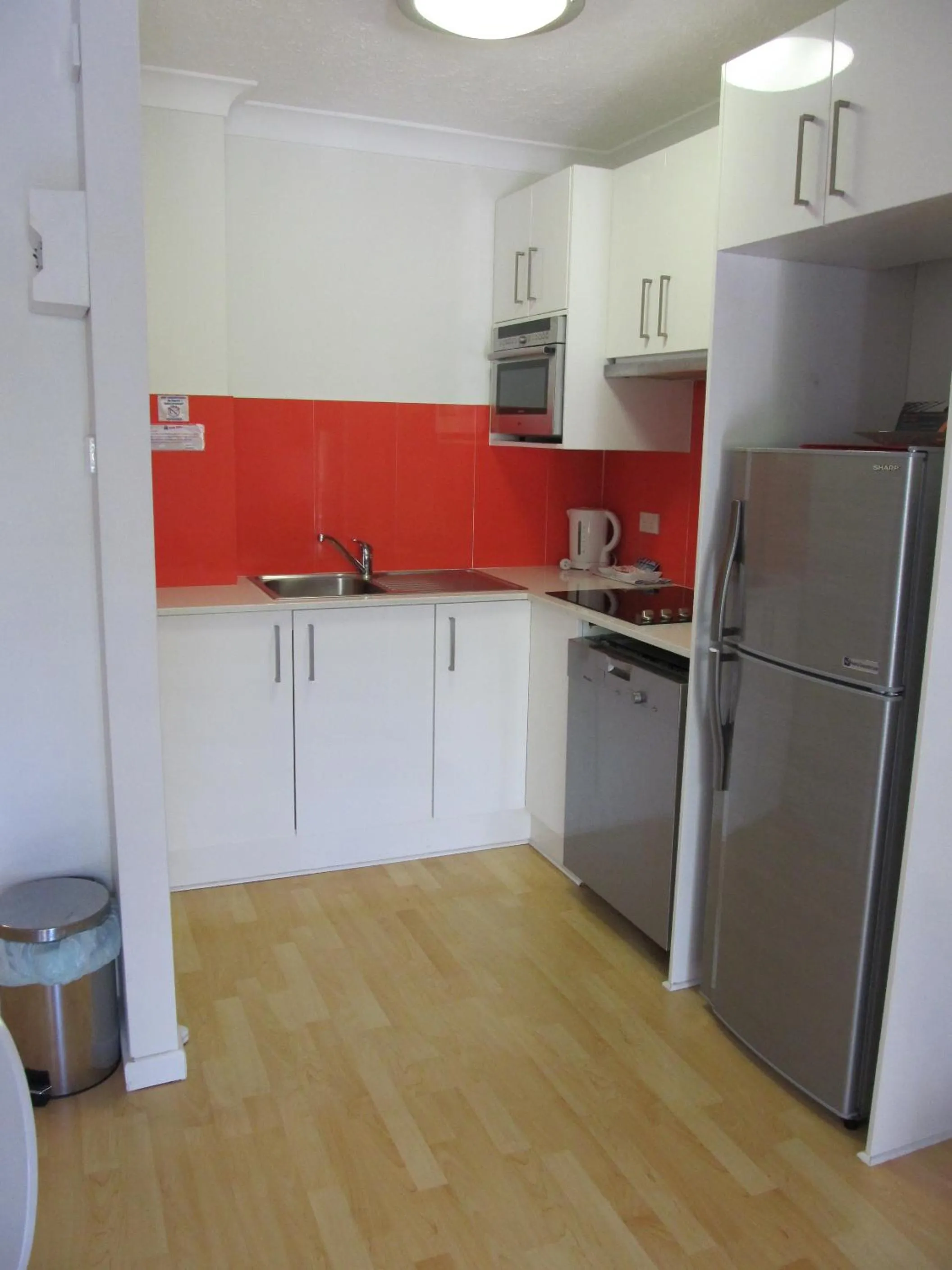 Kitchen or kitchenette in Costa D'Ora Holiday Apartments