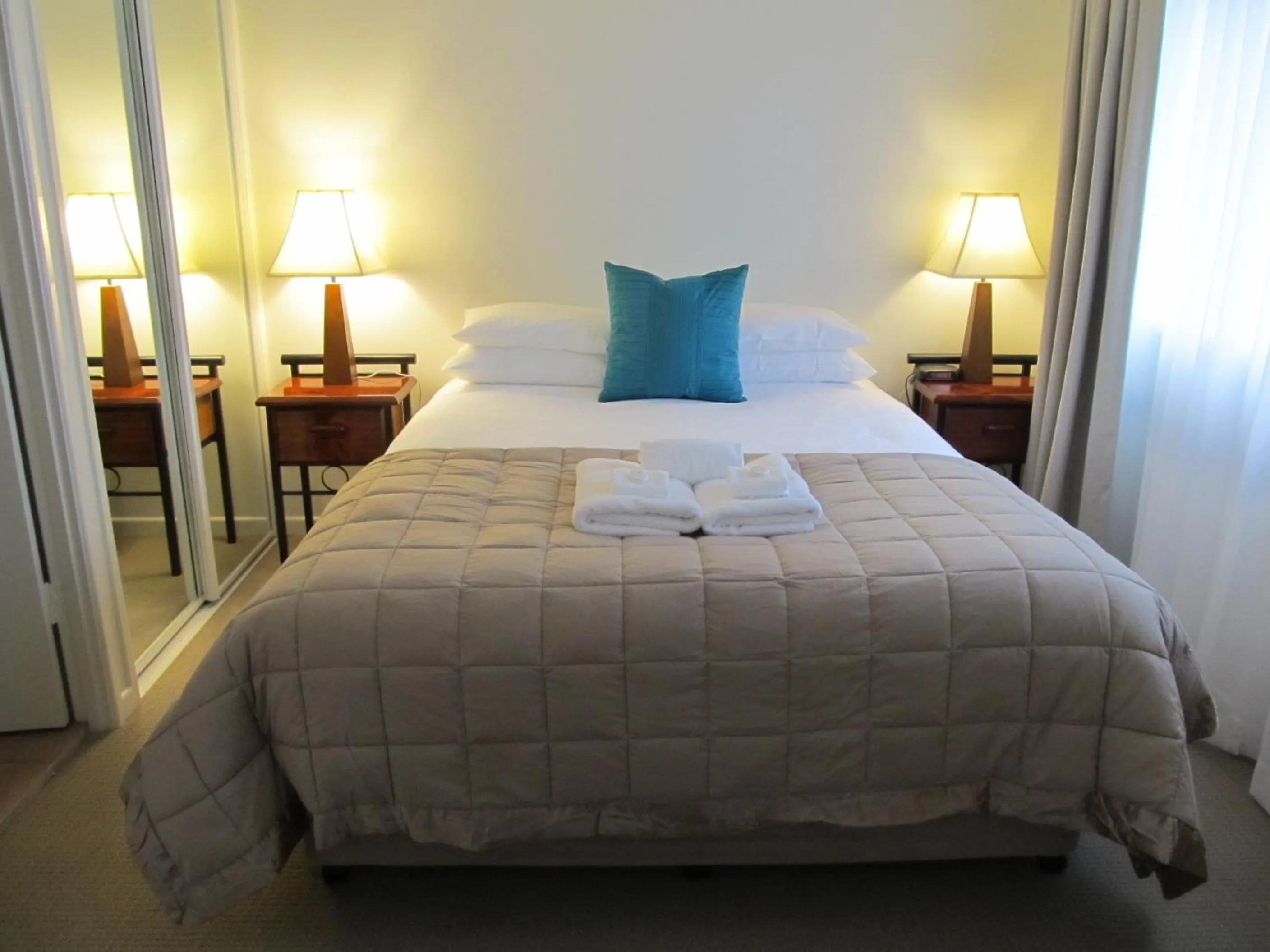 Bed in Costa D'Ora Holiday Apartments