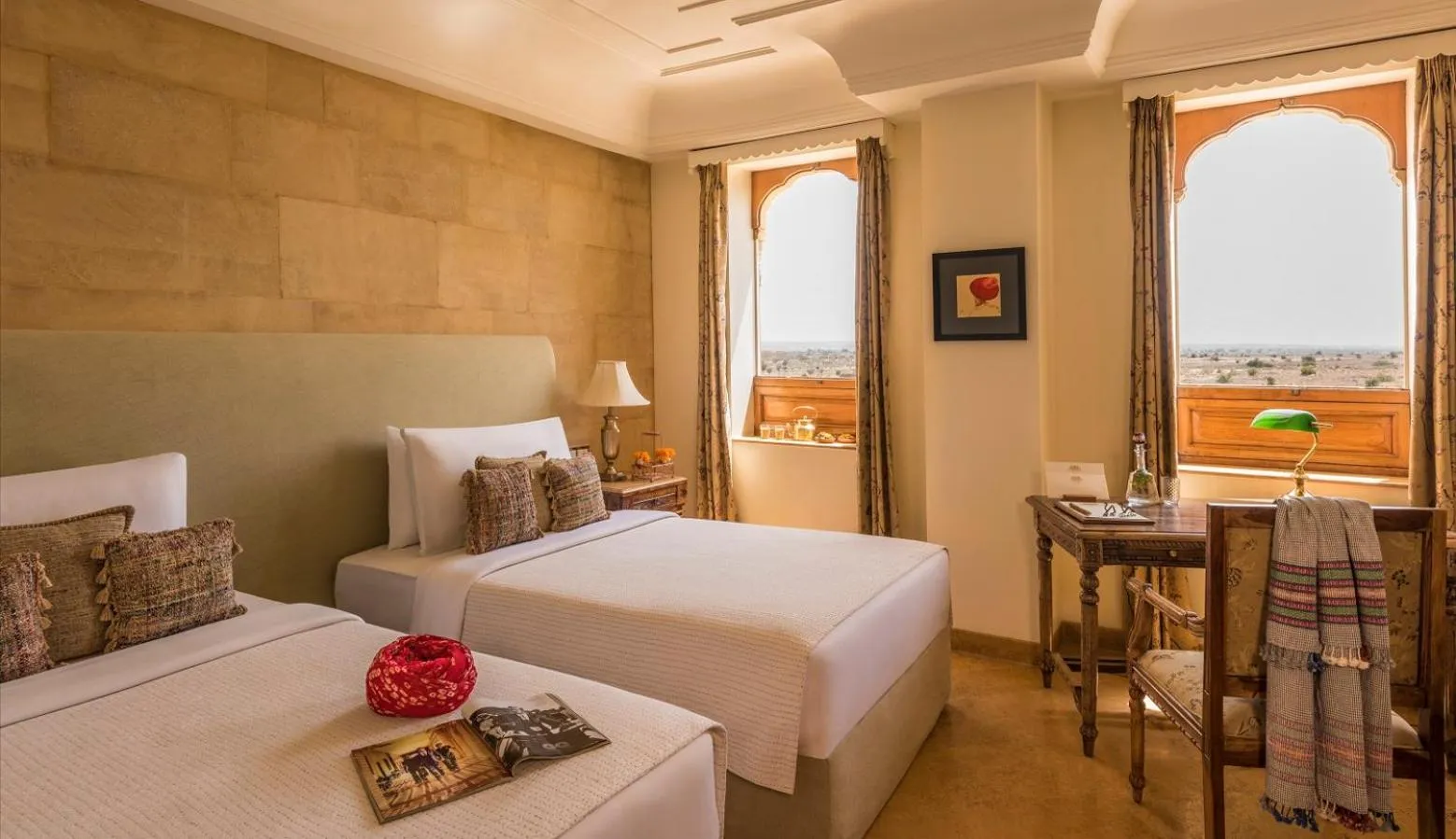 Photo of the whole room, Bed in Suryagarh Jaisalmer