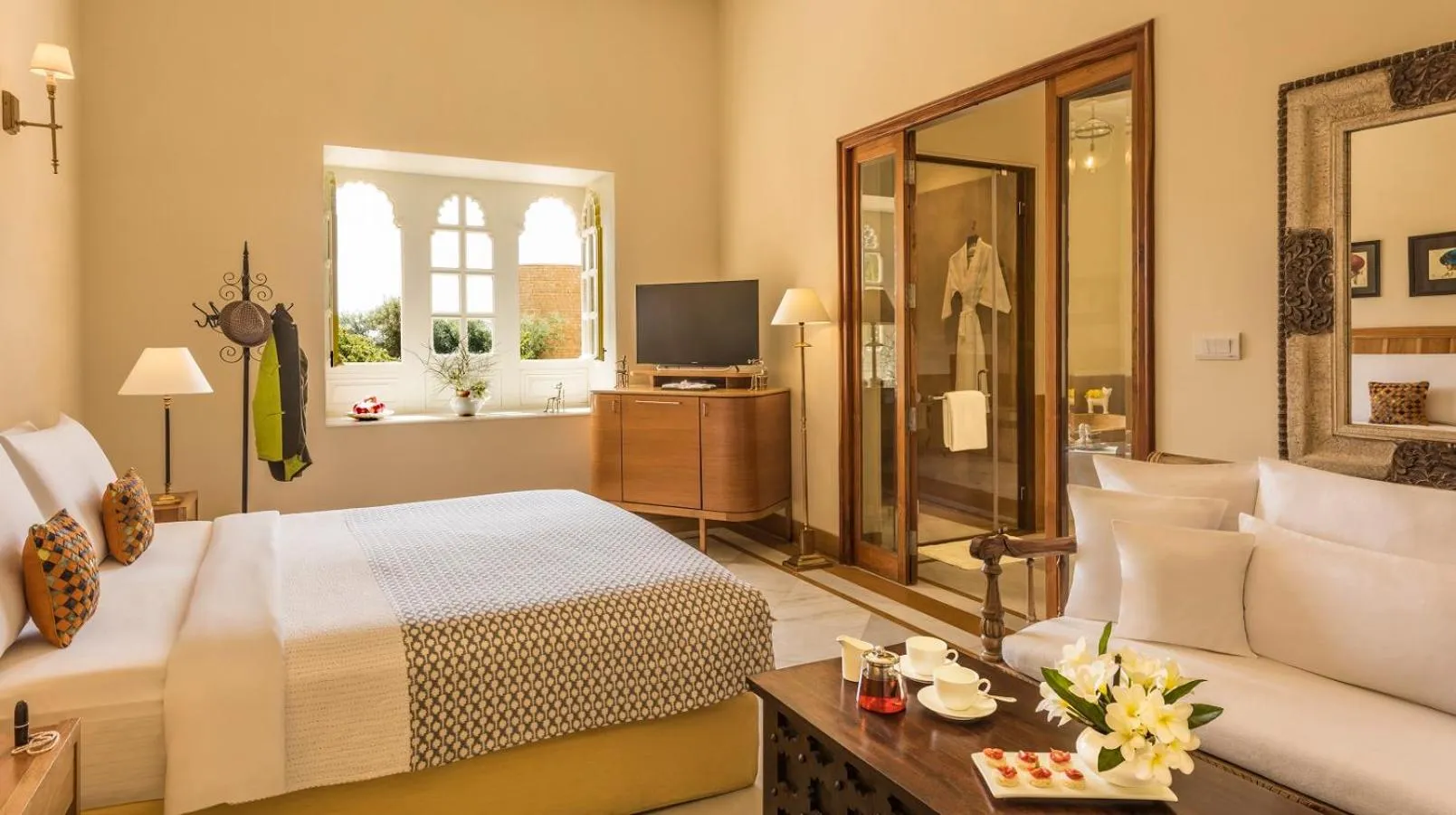 Photo of the whole room, Bed in Suryagarh Jaisalmer