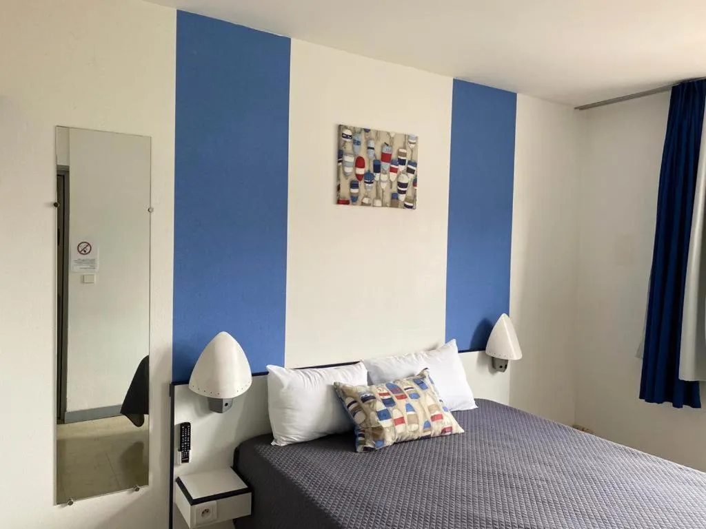 Bed in hotel l'échappée d'oléron