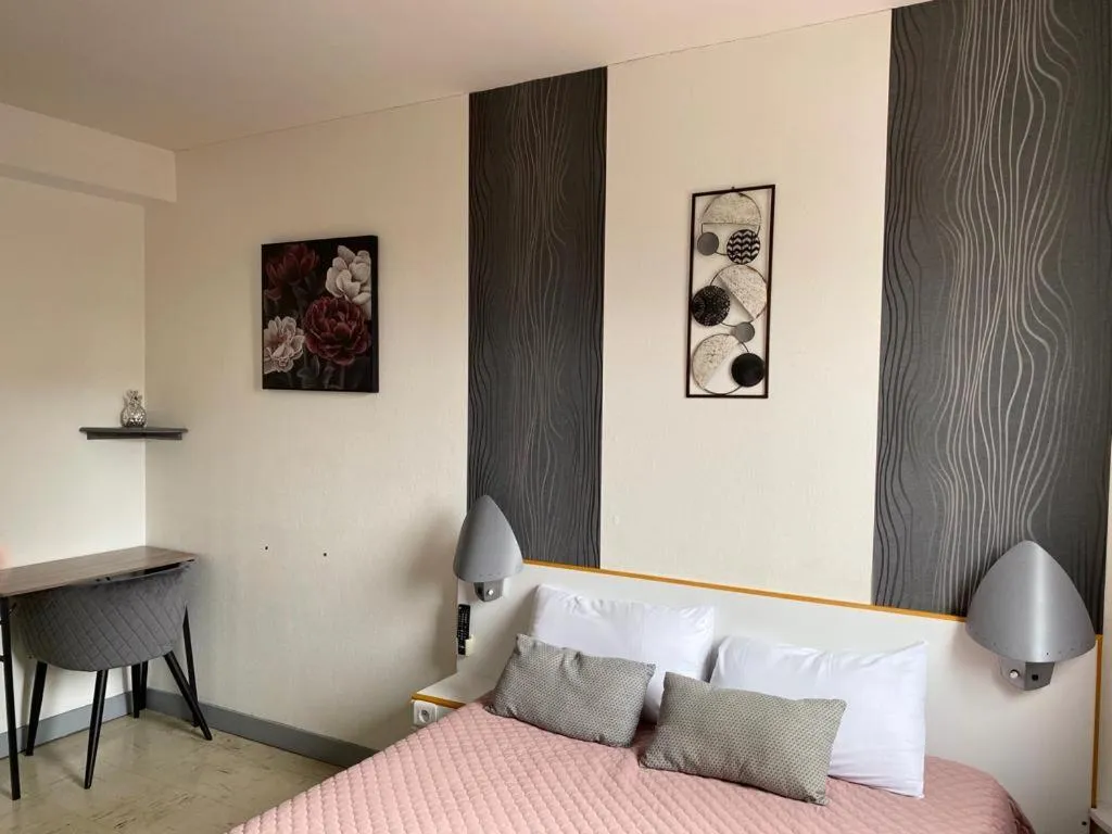 Bed in hotel l'échappée d'oléron