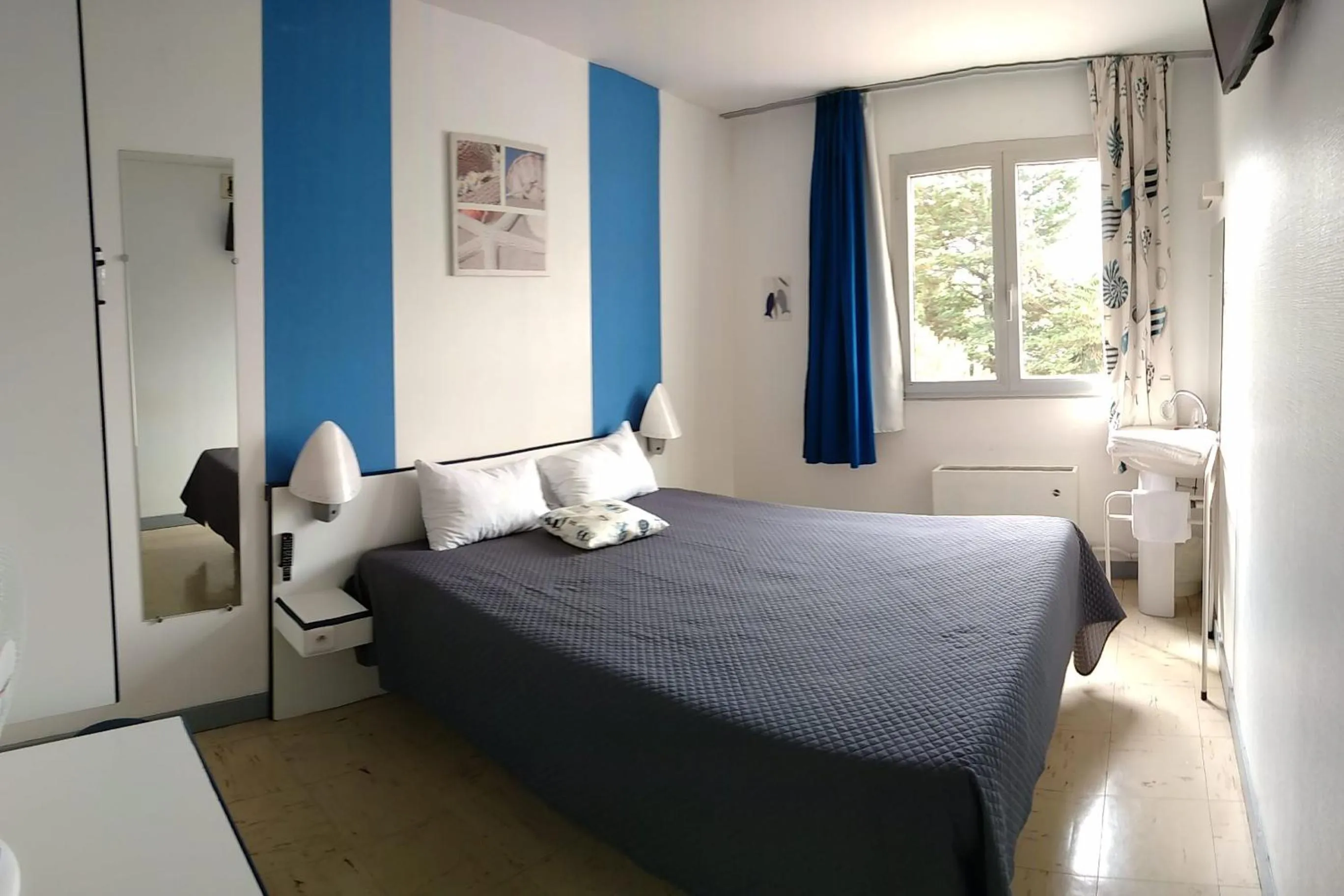 Bed in hotel l'échappée d'oléron