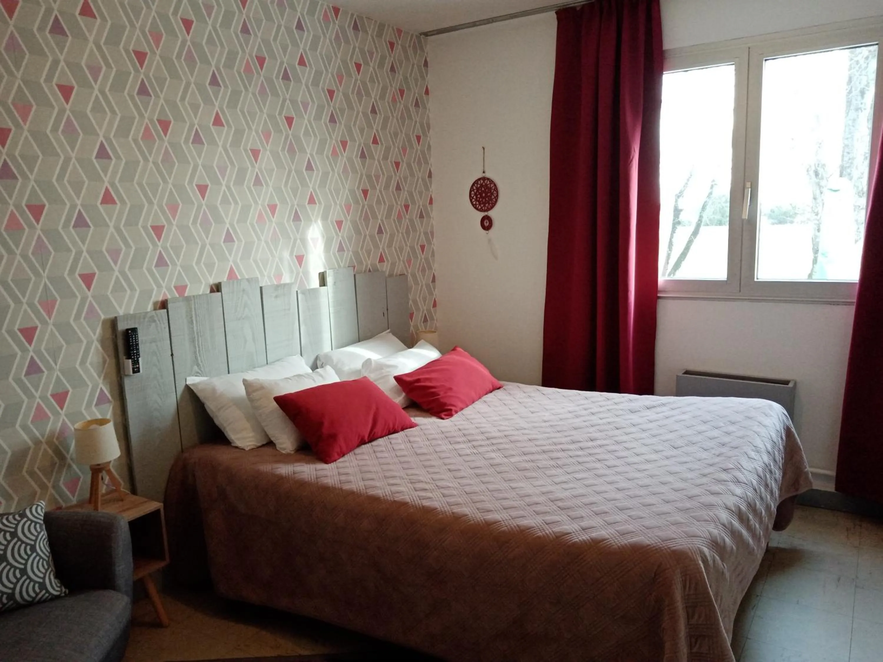 Bed in hotel l'échappée d'oléron