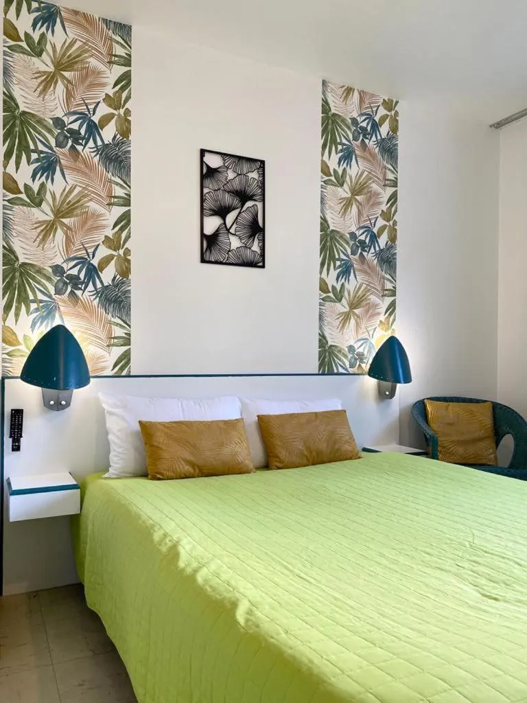 Bed in hotel l'échappée d'oléron