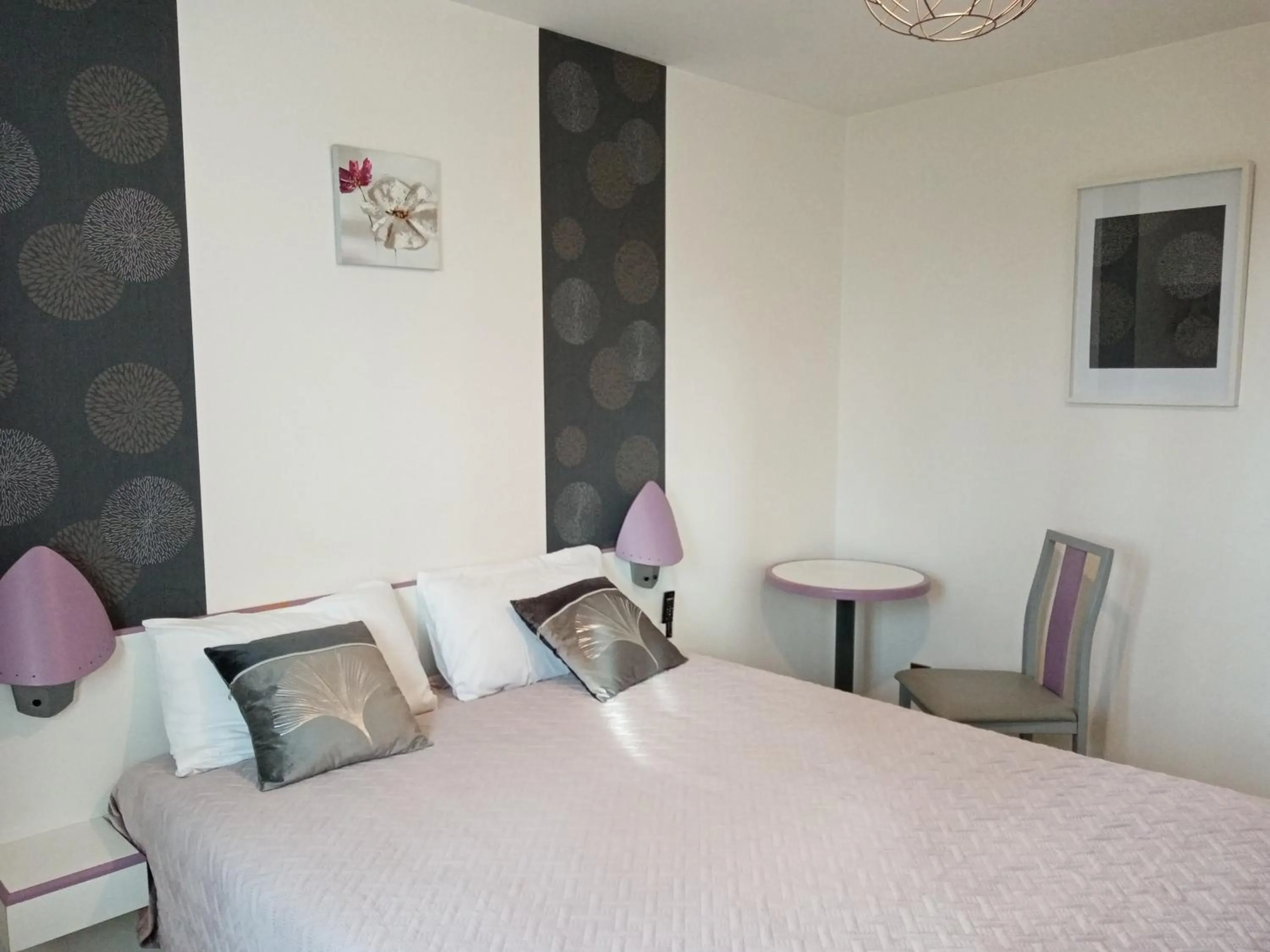 Bed in hotel l'échappée d'oléron