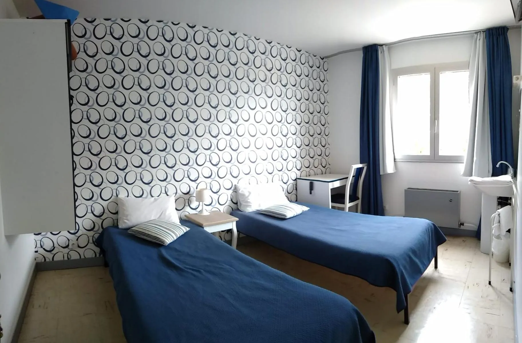 Bed in hotel l'échappée d'oléron