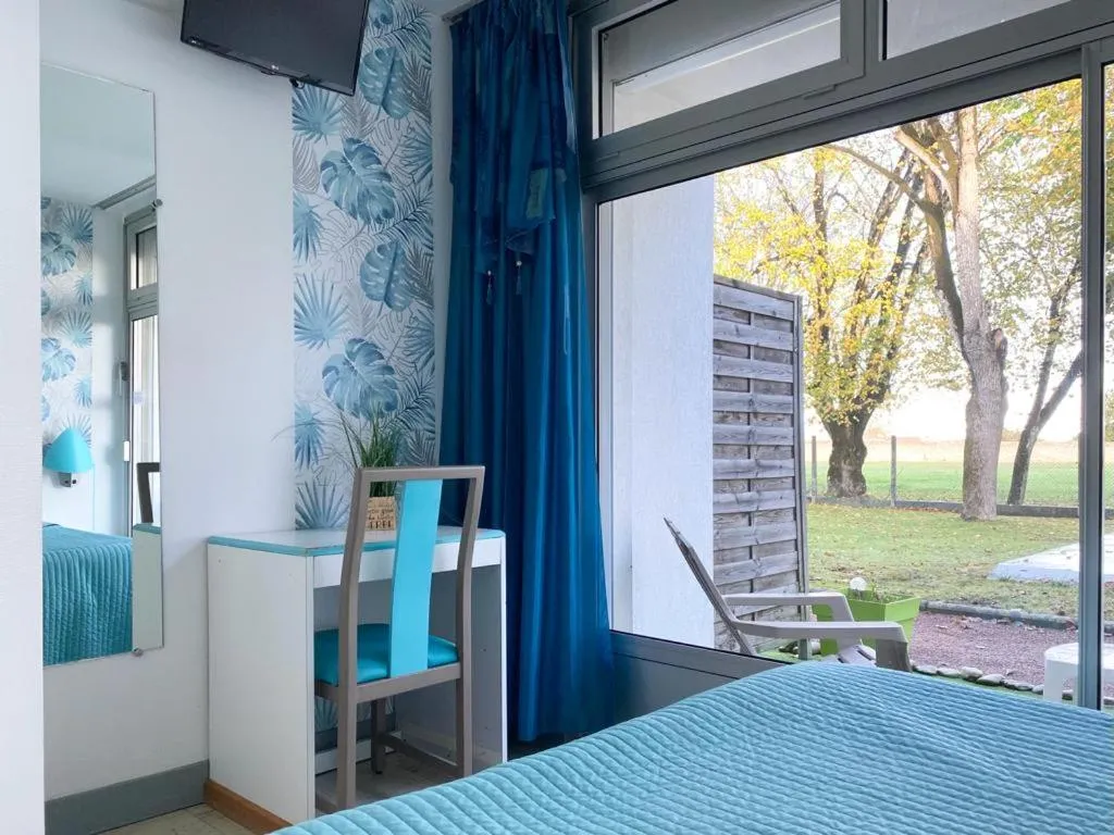 Bed in hotel l'échappée d'oléron