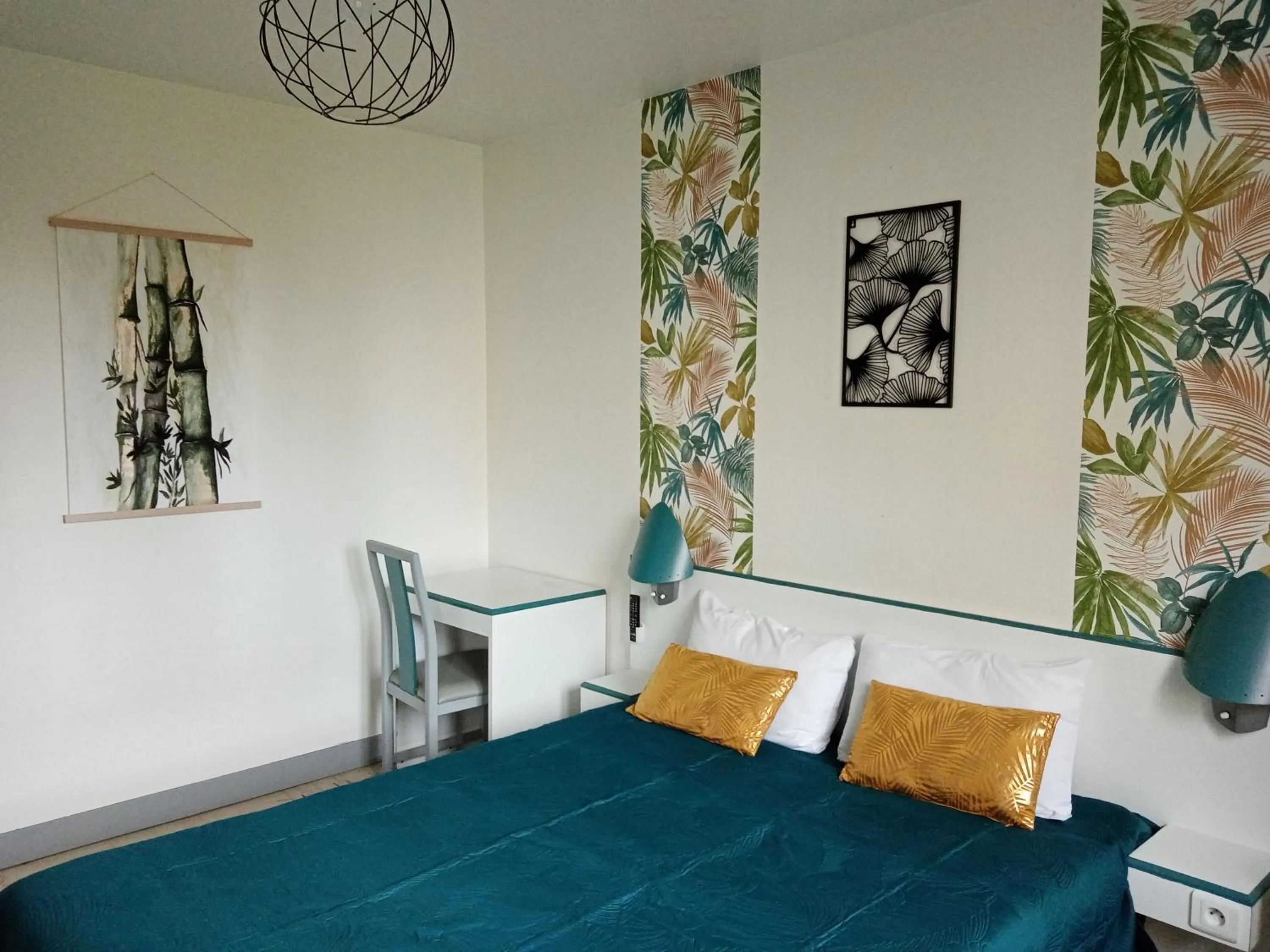 Bed in hotel l'échappée d'oléron