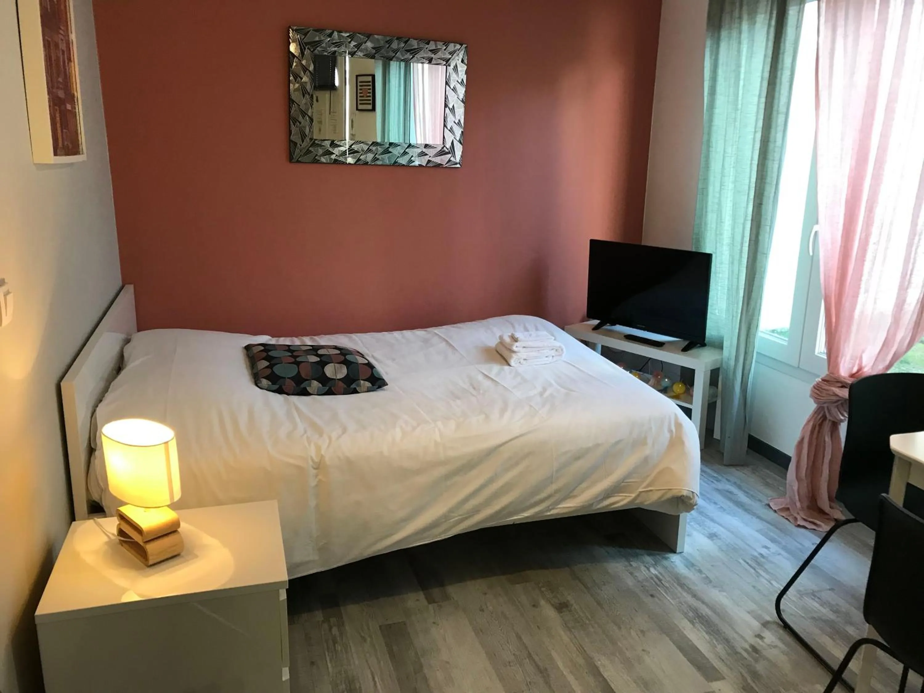 Bed in Trankil'Apparts Centre