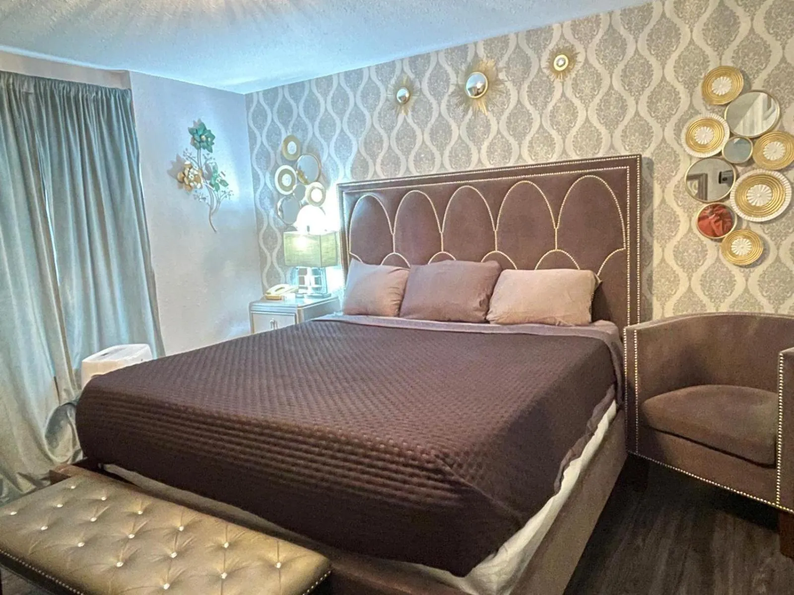 Bed in The Village Inn Hotel