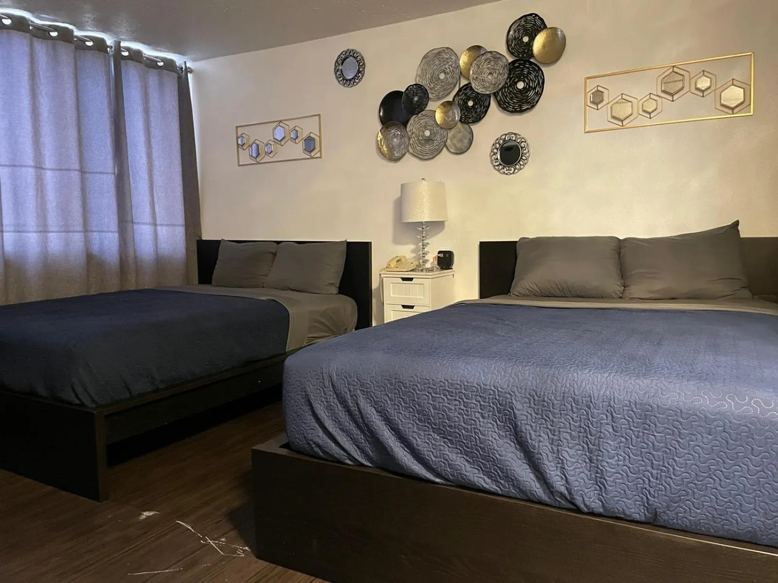 Bed in The Village Inn Hotel