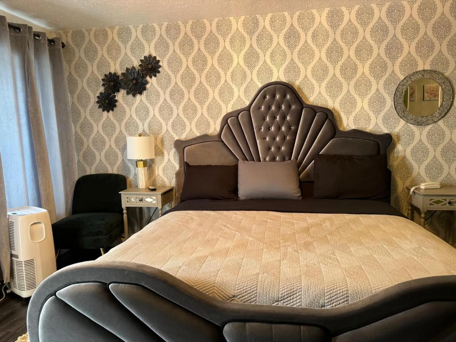 Bed in The Village Inn Hotel