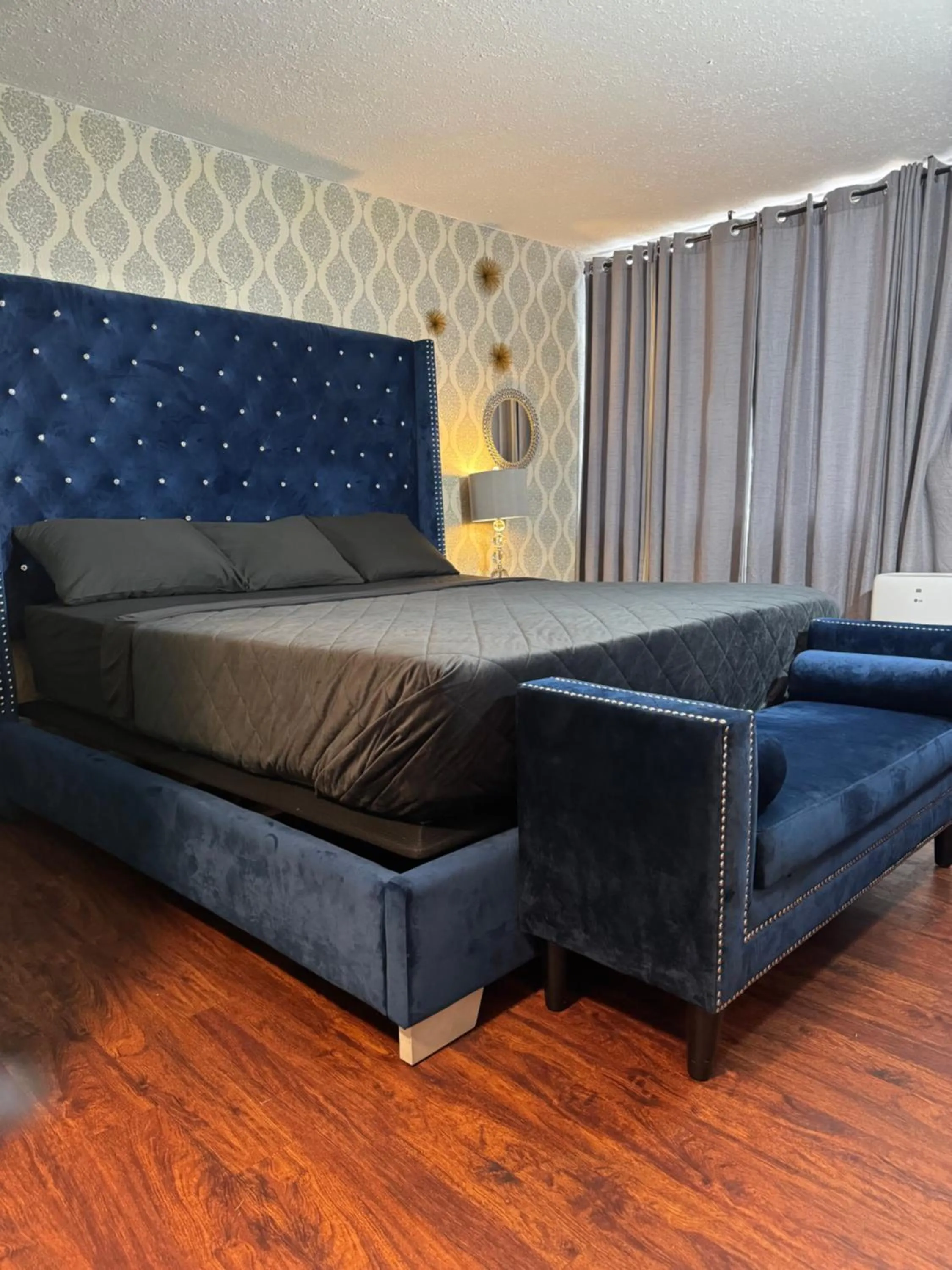 Bed in The Village Inn Hotel