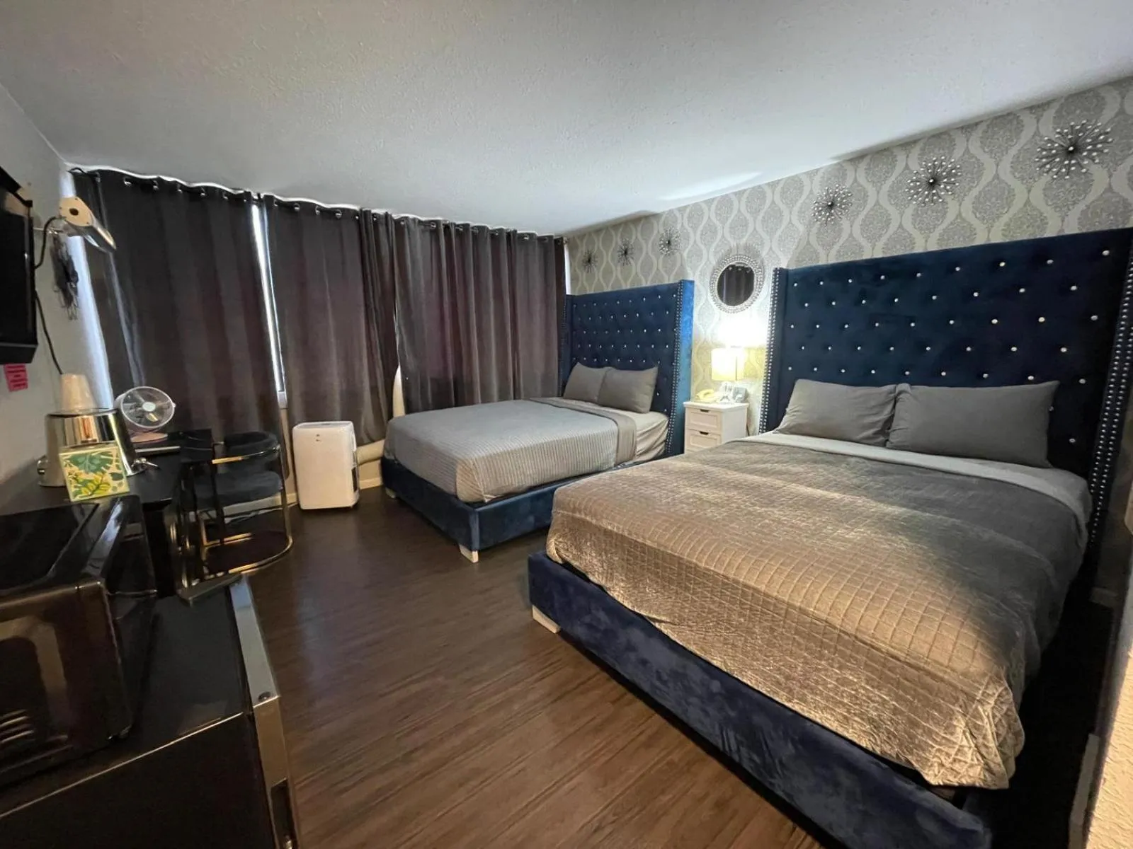 Bed in The Village Inn Hotel