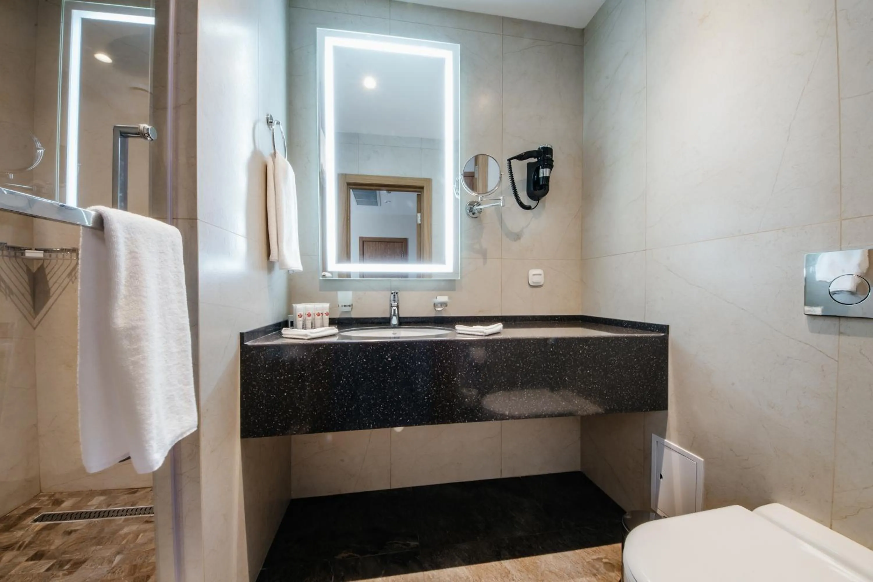 Shower in Ramada by Wyndham Astana